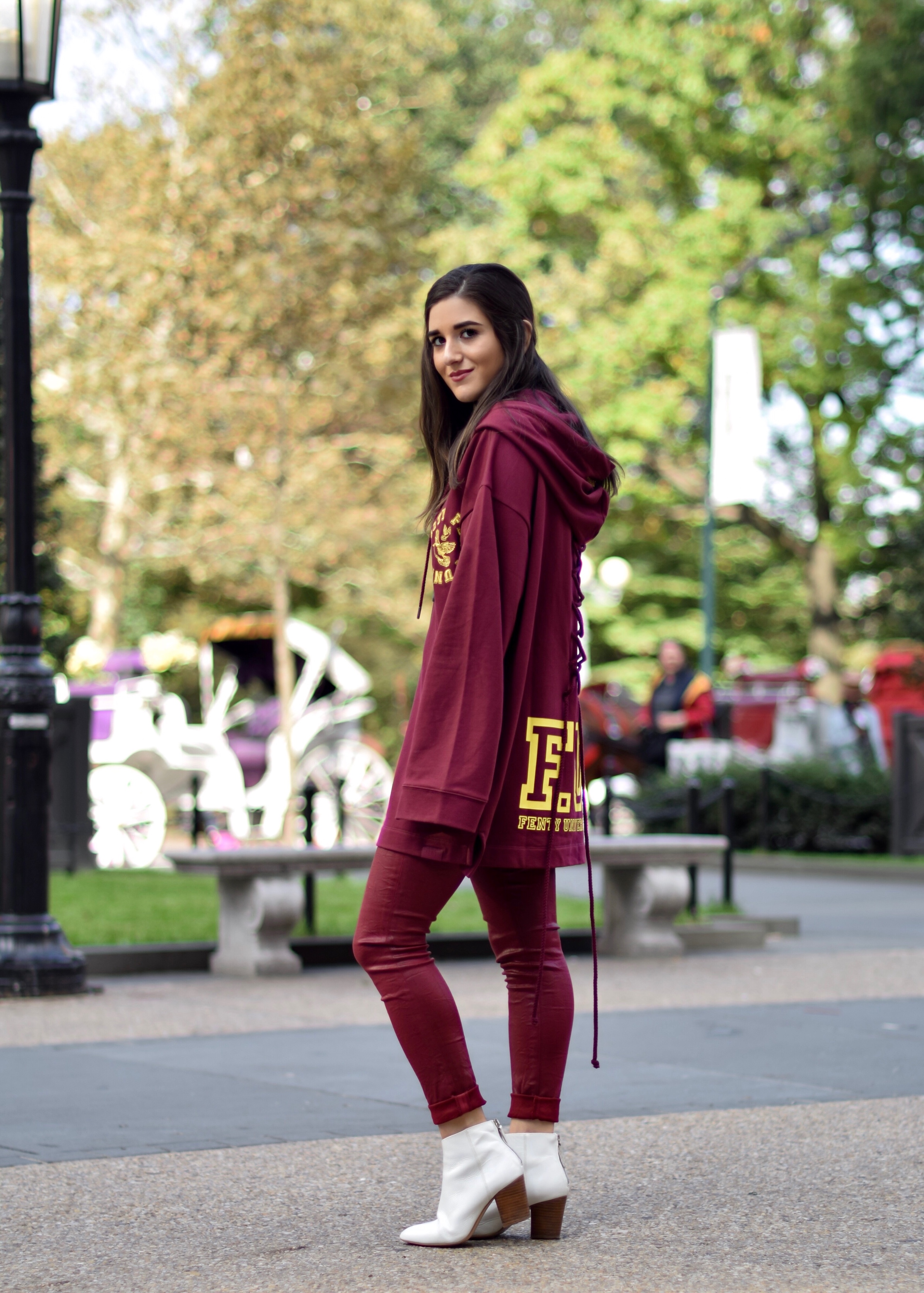 What Do Bloggers Still Pay For Monochrome Maroon Outfit White Booties Esther Santer Fashion Blog NYC Street Style Blogger Outfit OOTD Trendy Burgundy Color AG Jeans Fenty Puma Rihanna Oversized Sweatshirt Girl Women Shopping Winter Fall Look New  York.jpg