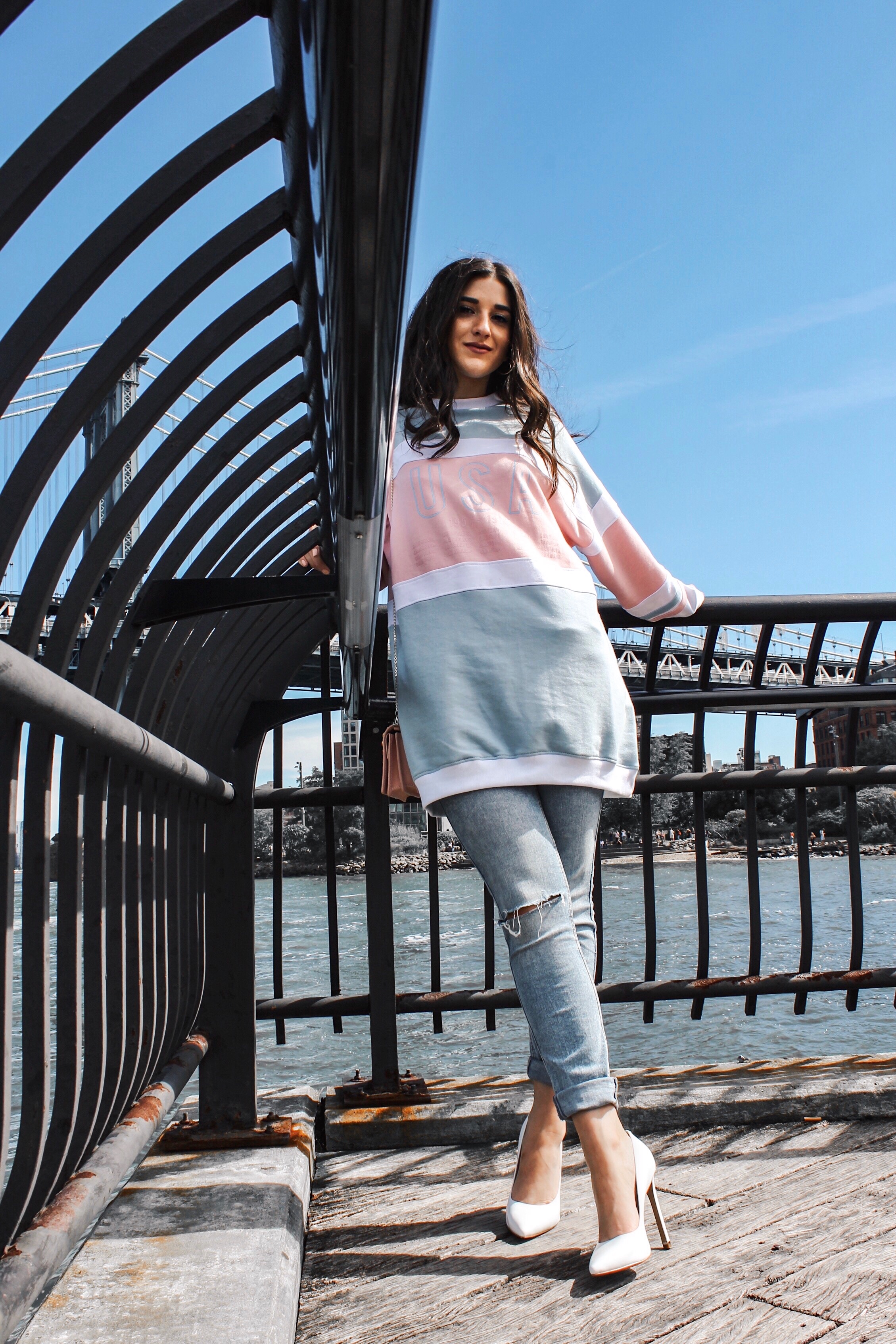 How To Style Kenneth Cole's White Riley Heels Esther Santer Fashion Blog NYC Street Style Blogger Outfit OOTD Trendy Brand Collaboration Comfortable Casual Wear Jeans Oversized Sweatshirt  Pink Zac Posen Bag Girl Women Dumbo Photoshoot Carousel Bridge.jpg