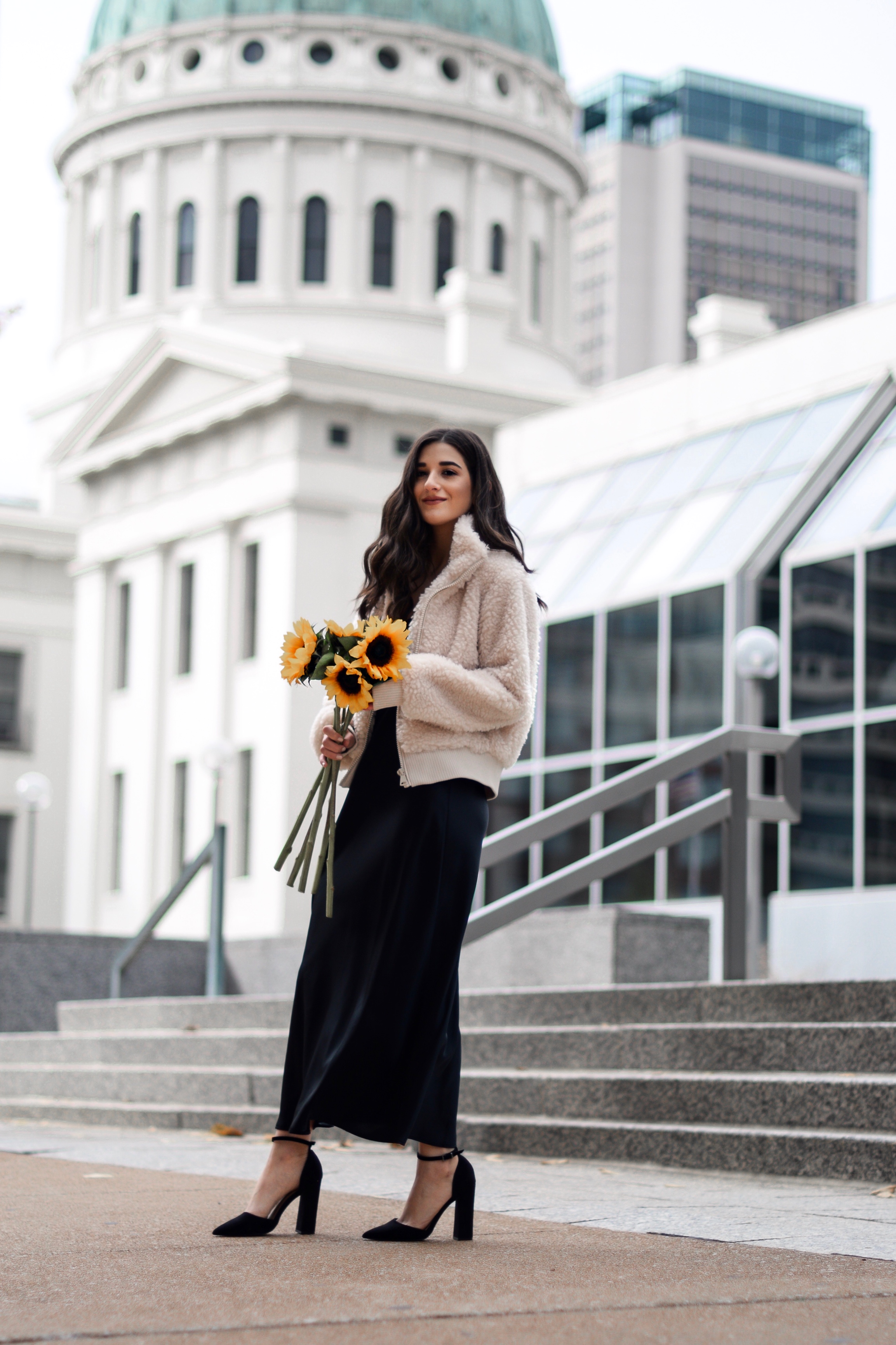 The 10 Most Frustrating Parts Of Brand Collabs Long Black Slip Dress Shearling Jacket Esther Santer Fashion Blog NYC Street Style Blogger Outfit OOTD Trendy Shopping St. Louis Photoshoot Hometown Downtown Saint Louis Sunflowers Yellow Flowers  Heels.jpg