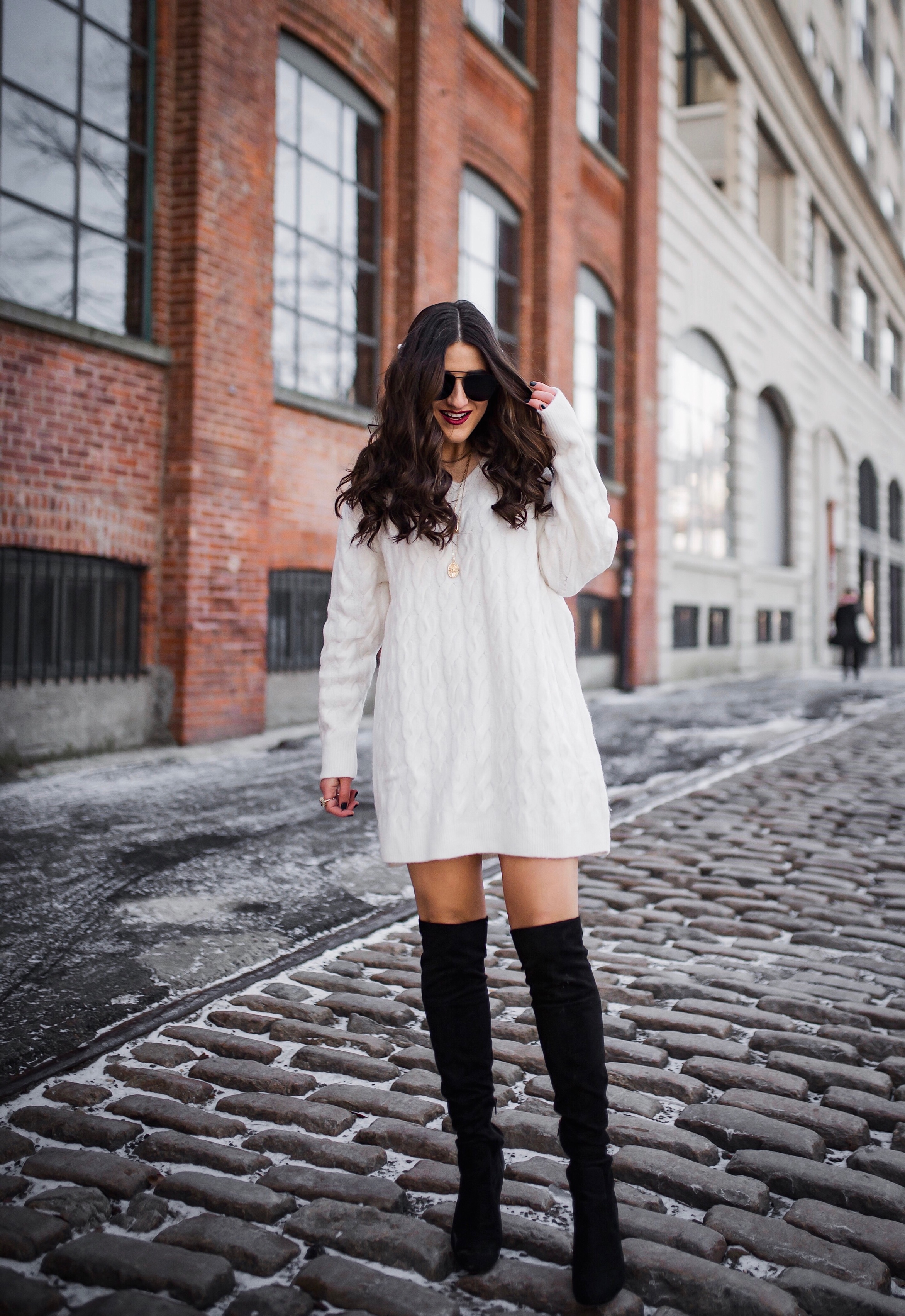 white sweater dress with boots