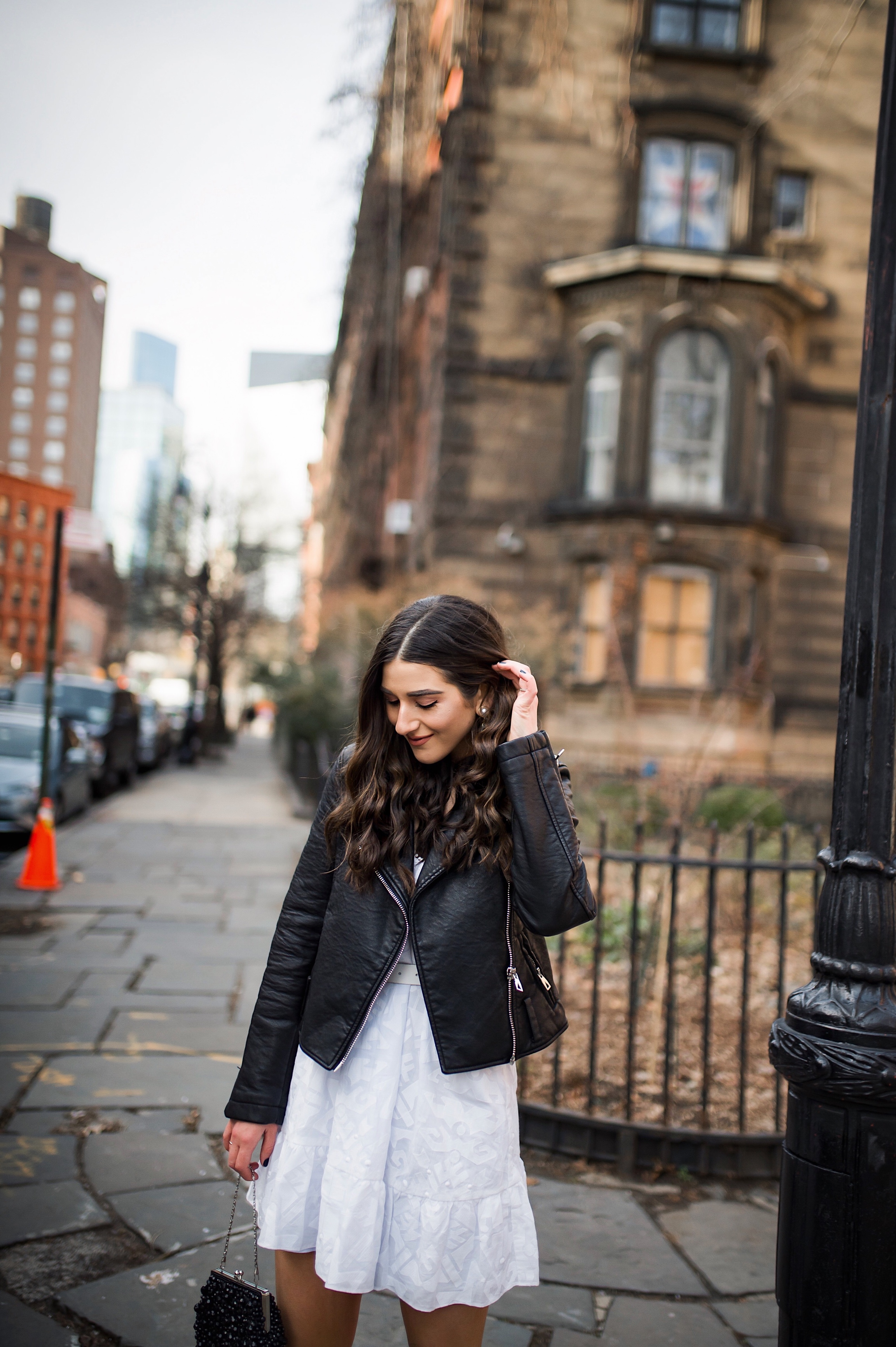 5 Things I Wish Brands Knew White Dress Leather Jacket Esther Santer Fashion Blog NYC Street Style Blogger Outfit OOTD Trendy Shopping Girl What How To Wear  Urban Outfitters ASOS Belt Booties Black Beaded Clutch Long Hair Photoshoot Stuyvesant Shop.JPG