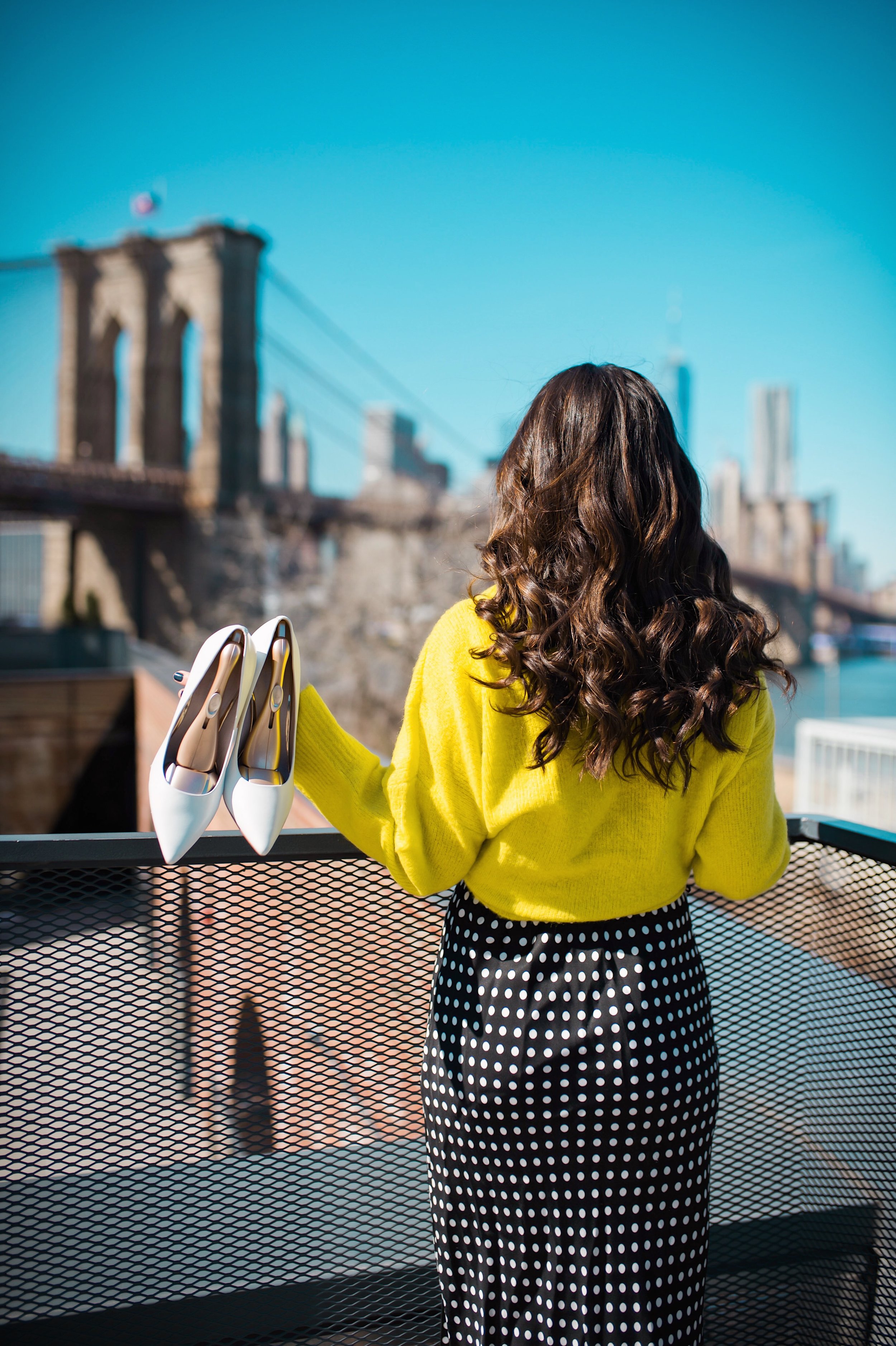 How I Wound Up With Boring White Dishes Navy Polka Dot Dress Neon Yellow Knotted Sweater Esther Santer Fashion Blog NYC Street Style Blogger Outfit OOTD Trendy Shopping Girl What How To Wear White Heels Photoshoot Laurel Creative Dumbo Brooklyn Bridge.JPG