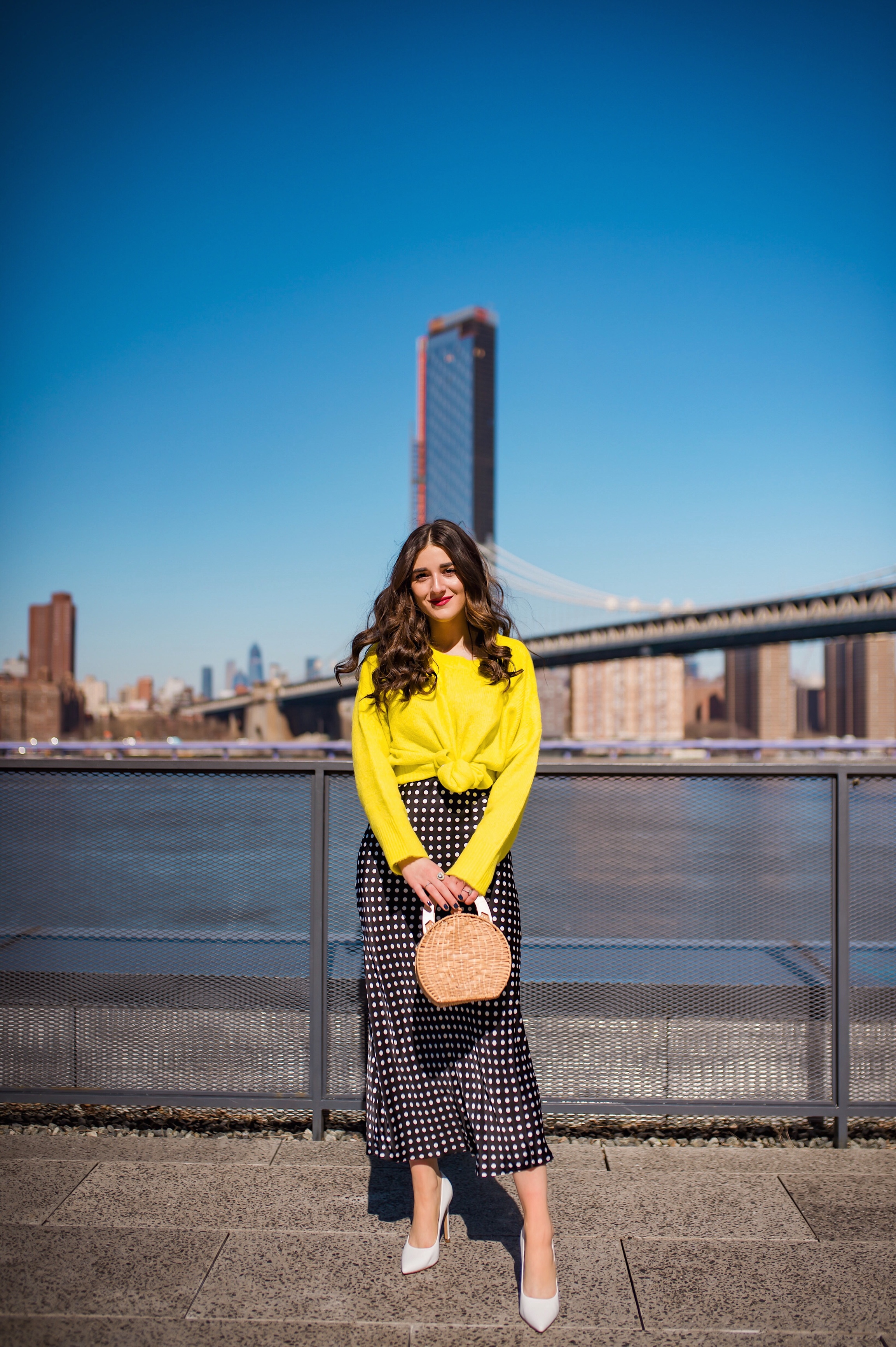 How I Wound Up With Boring White Dishes Navy Polka Dot Dress Neon Yellow Knotted Sweater Esther Santer Fashion Blog NYC Street Style Blogger Outfit OOTD Trendy Shopping Girl White Heels What How To Wear Brooklyn Bridge Laurel Creative Photoshoot Dumbo.JPG