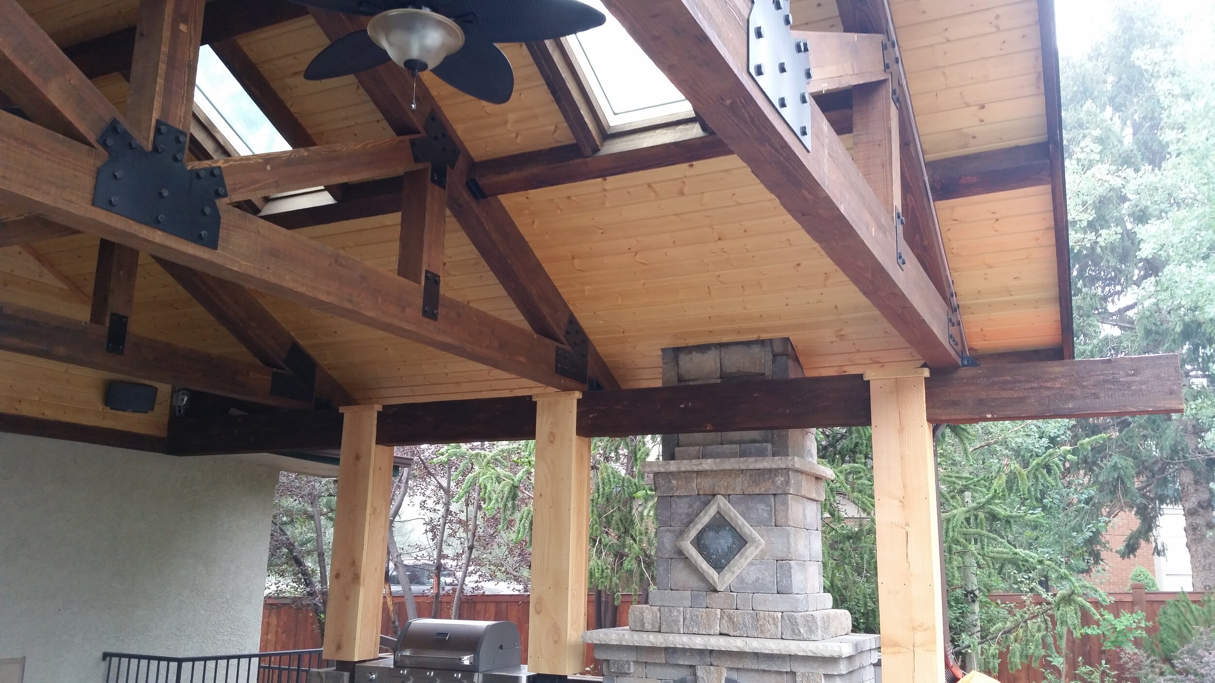 new covered patio with fire place.jpg