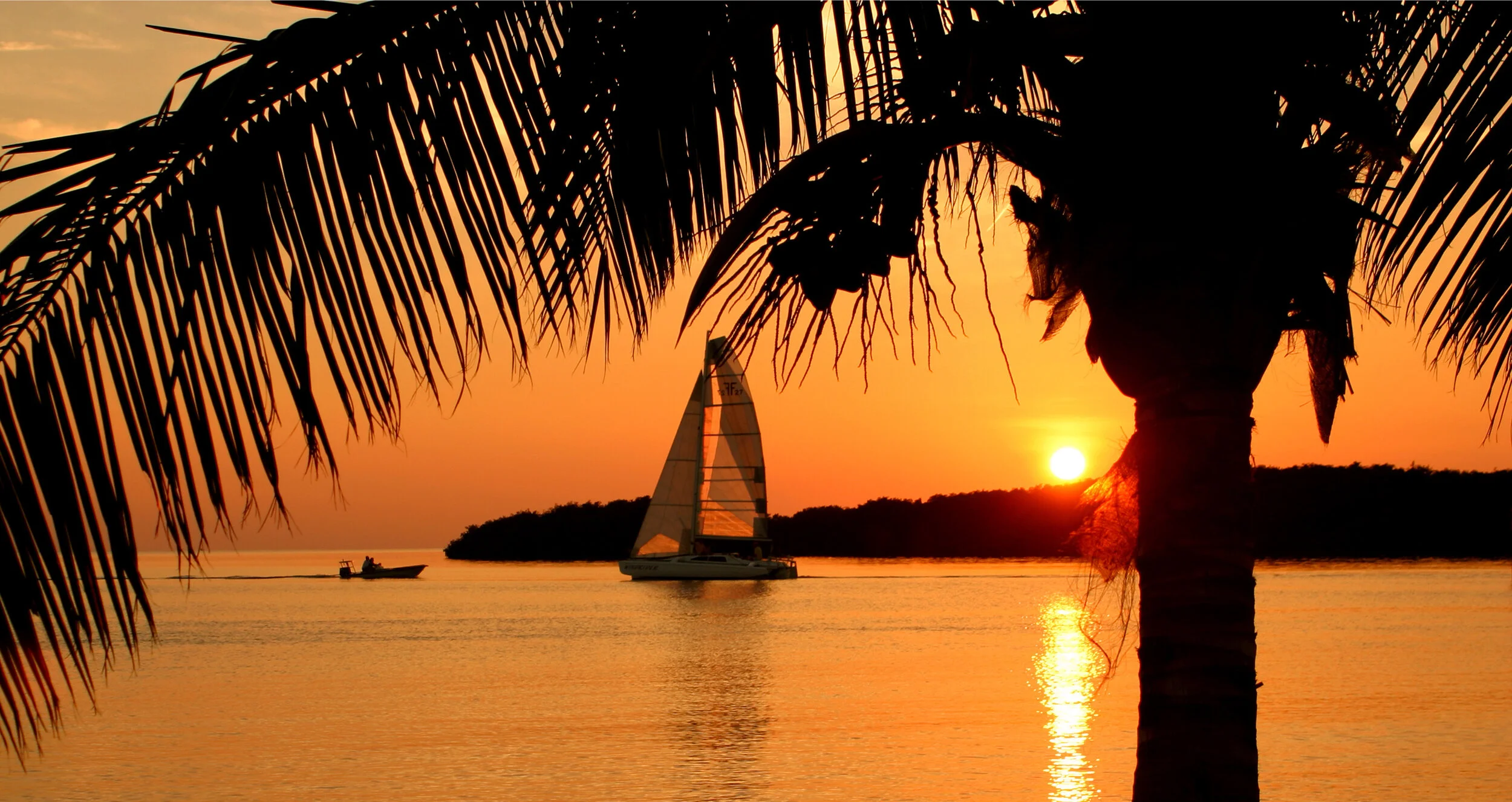 Sunset-Florida-Keys-Sailboat-by-Carlos-Gauna-shutterstock_185284.jpg