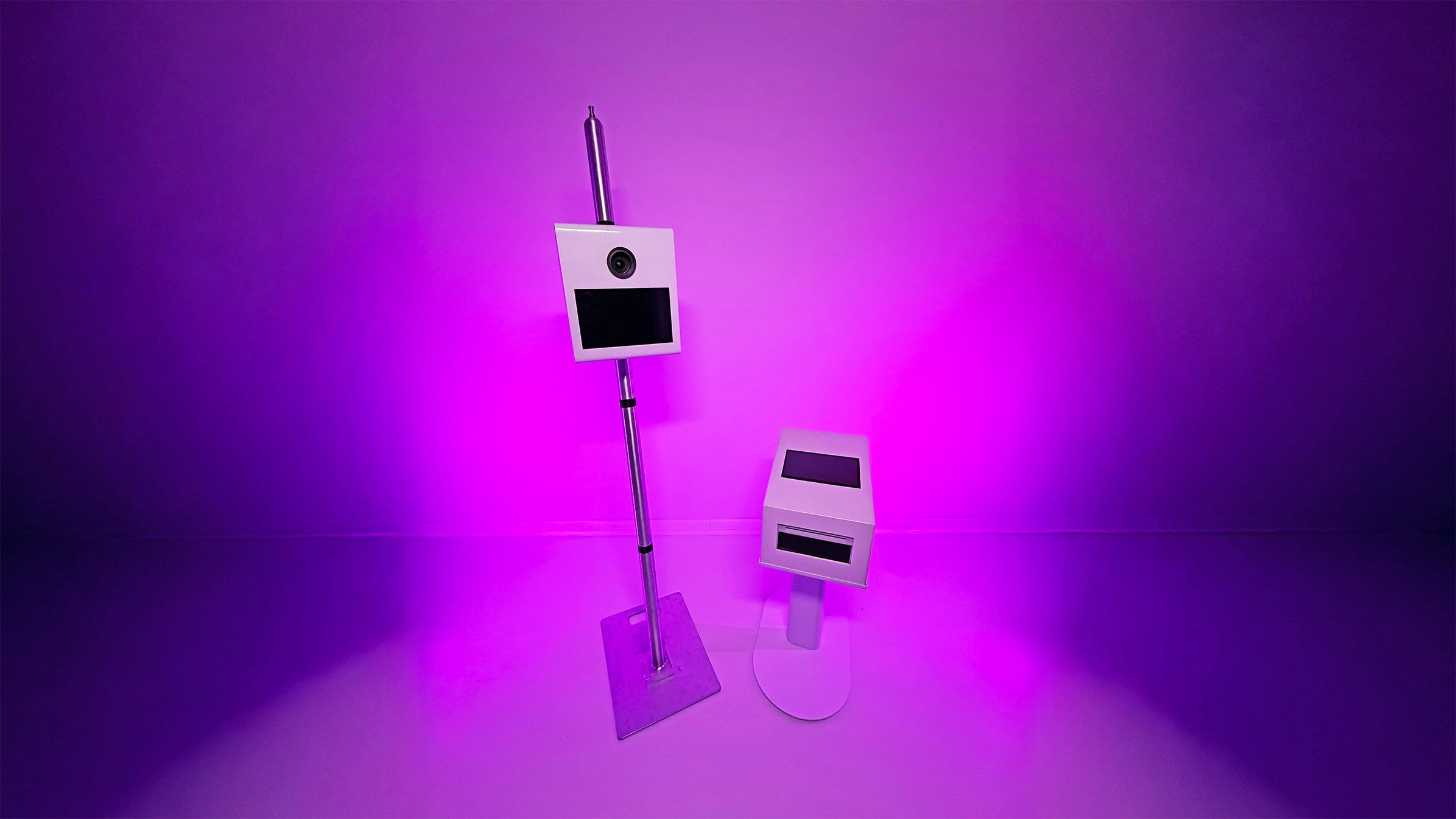 Smart design showing separation of the Klixbot photo booth and print and share station.