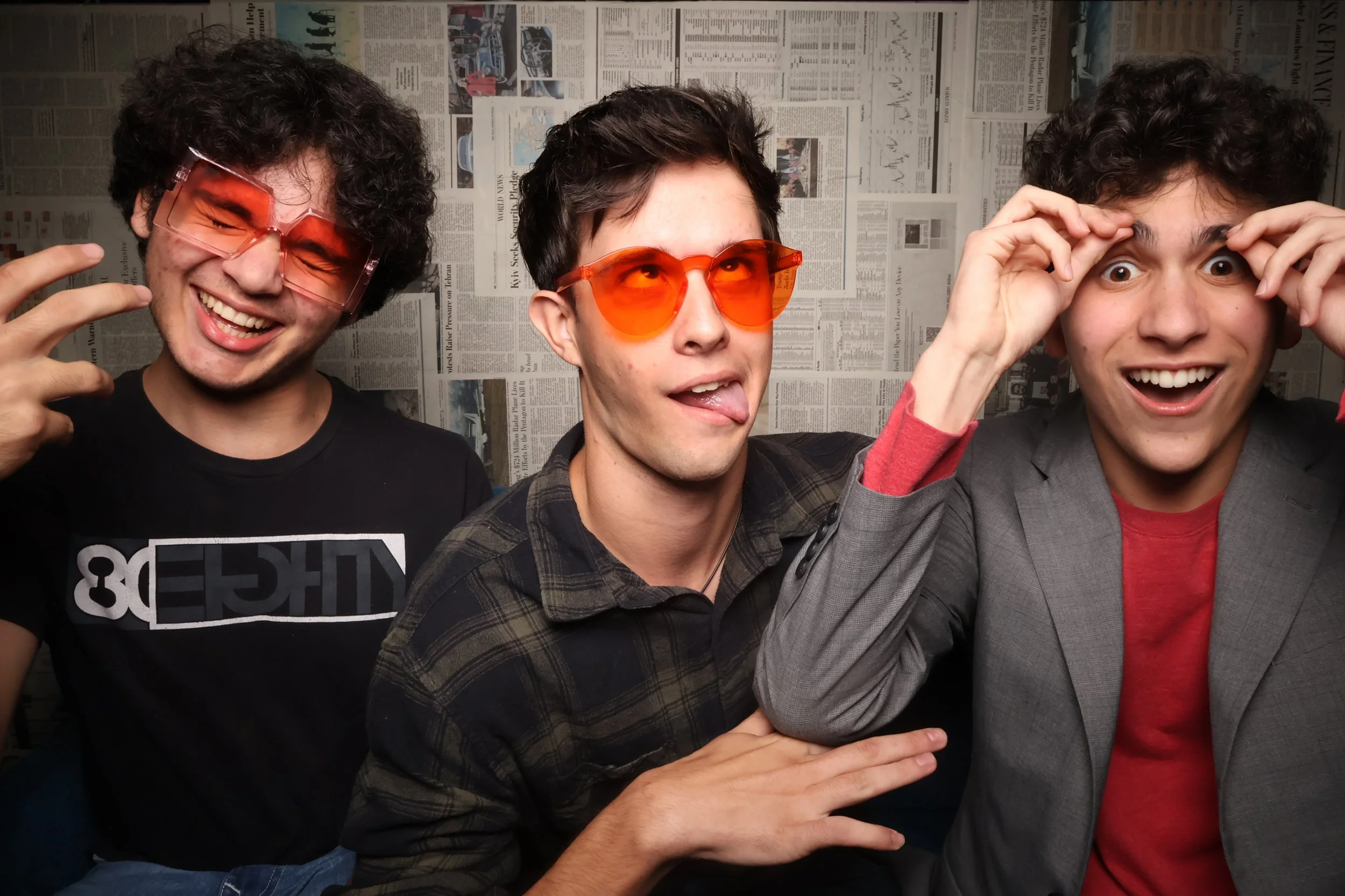 Three legends in the Klixbot sit down photo booth