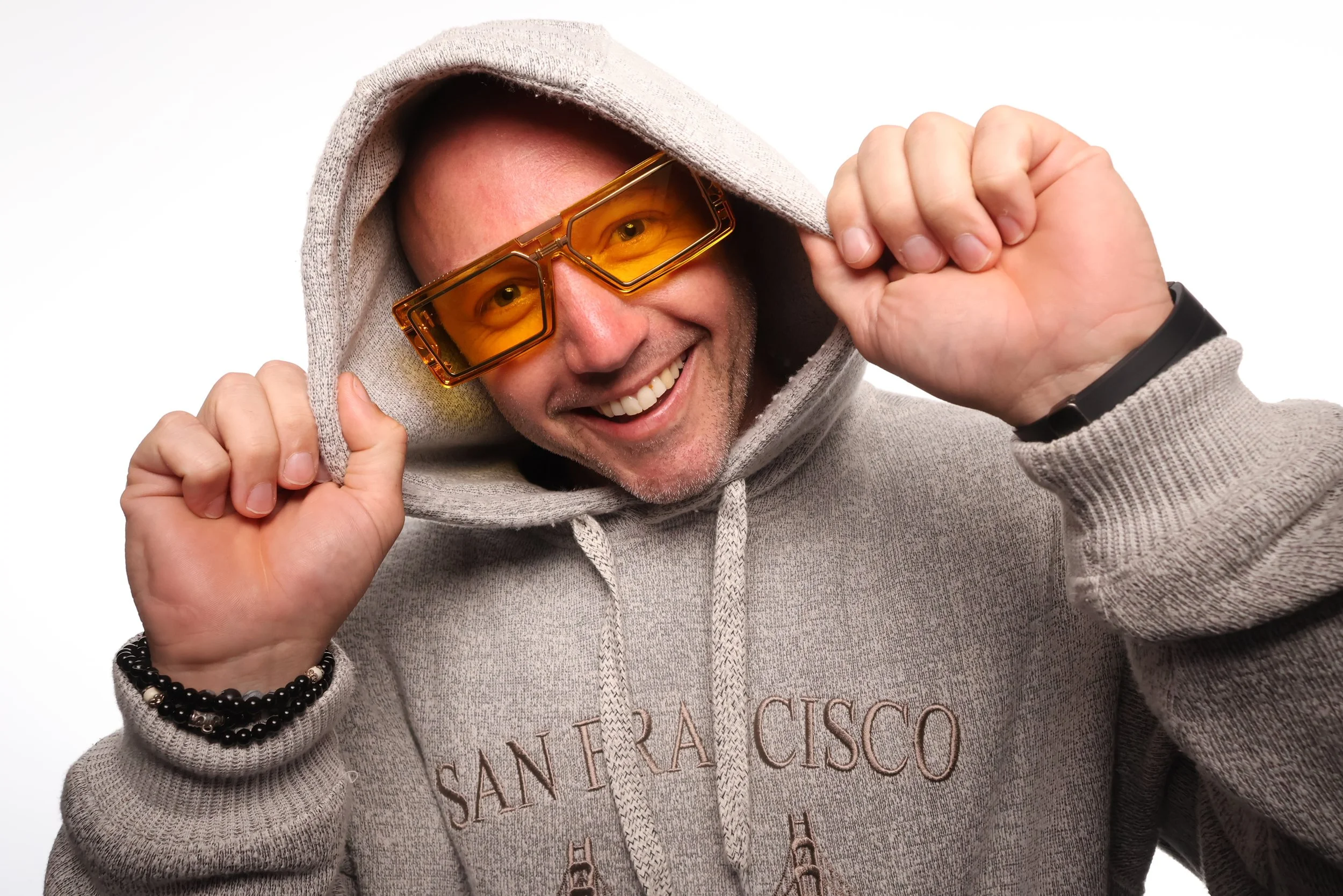 A cool dude flashing a smile in the Klixbot photo booth