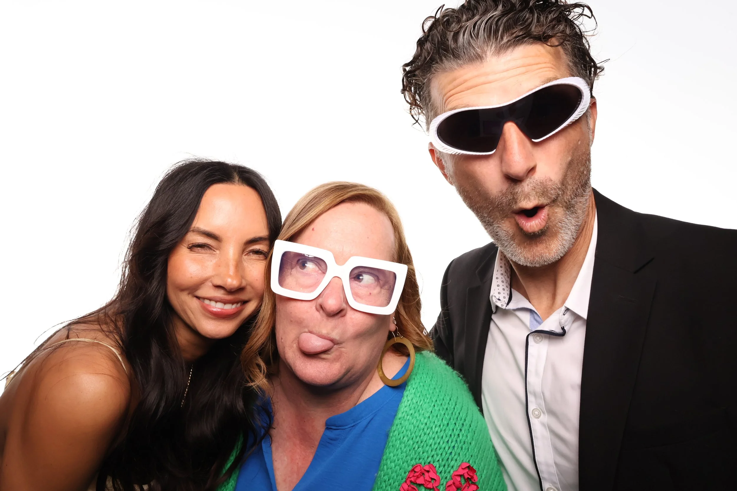 Fun group nailing their pictures in the Klixbot photo booth.