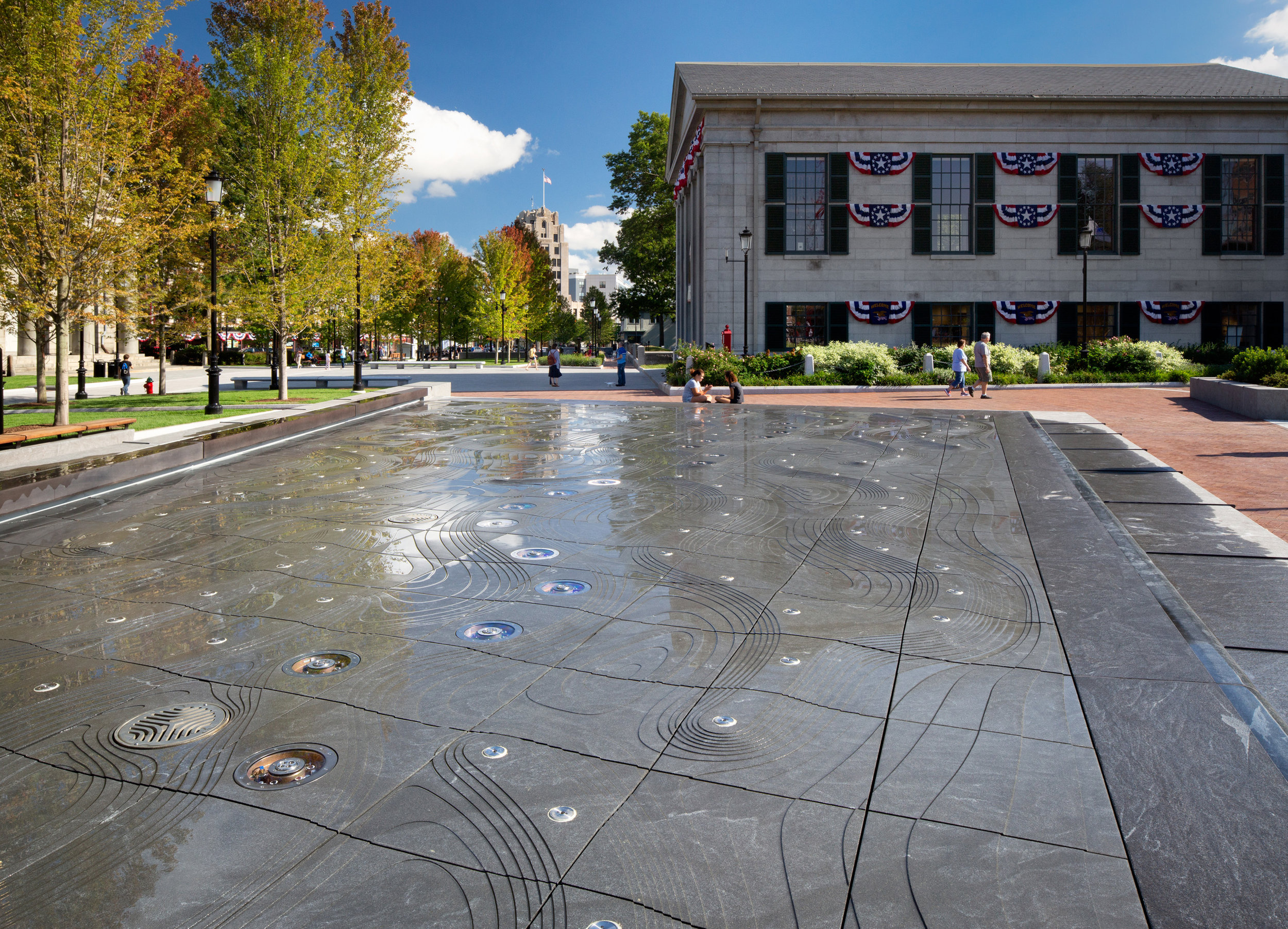 Tidal fountain in reflecting pool mode at Hancock Adams Common (Photographer: Ed Wonsek)