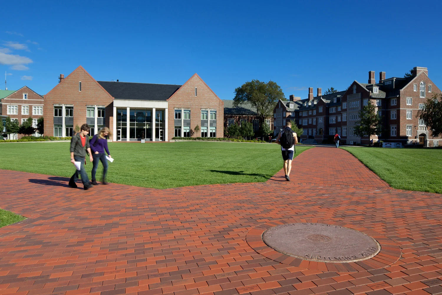 WPI’s colors of crimson and gray are reflected in the brick walkways. (Photo by Ed Wonsek)