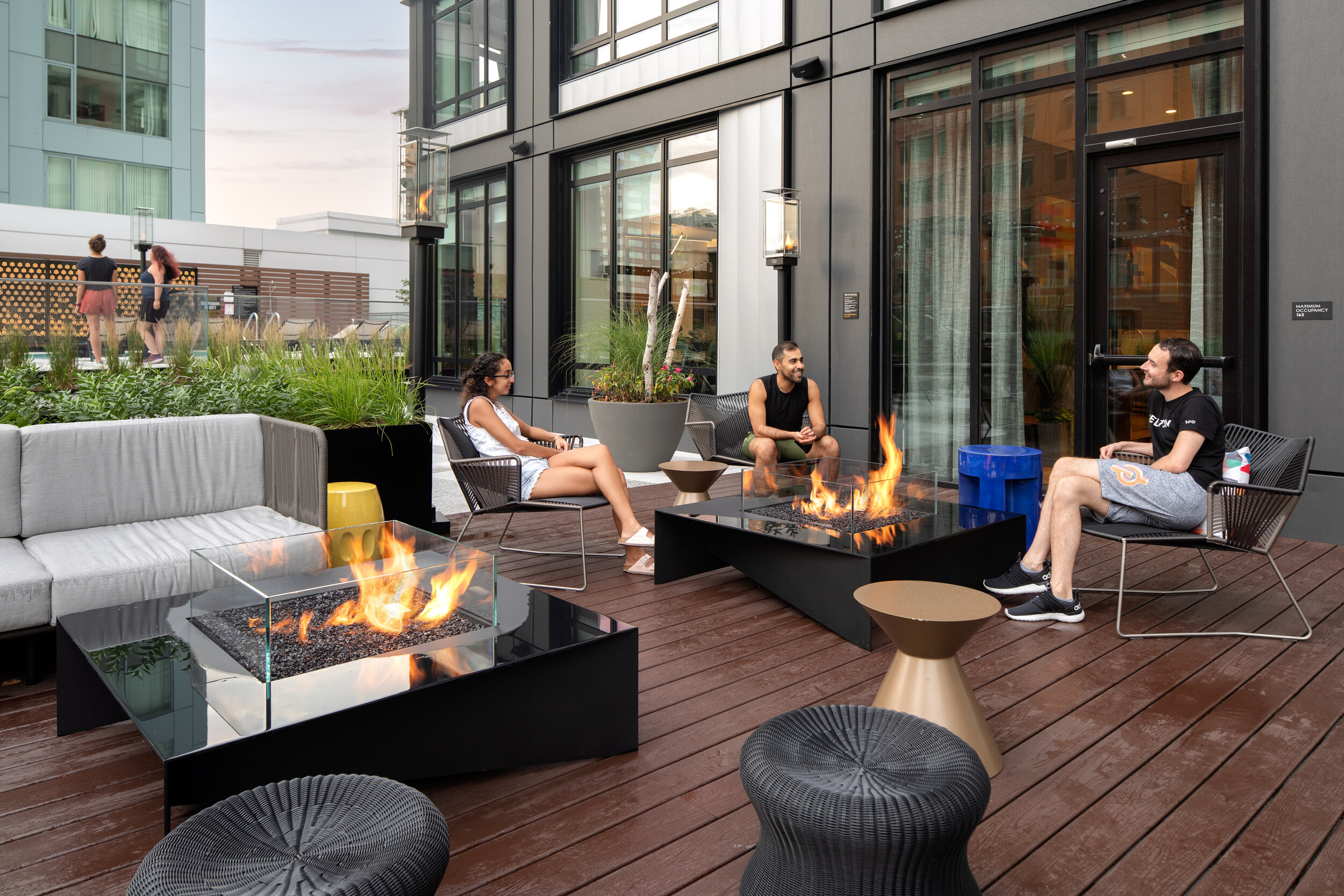  Fire pits and flexible seating at Gables Seaport Amenity Terrace (Photo by Ed Wonsek) 