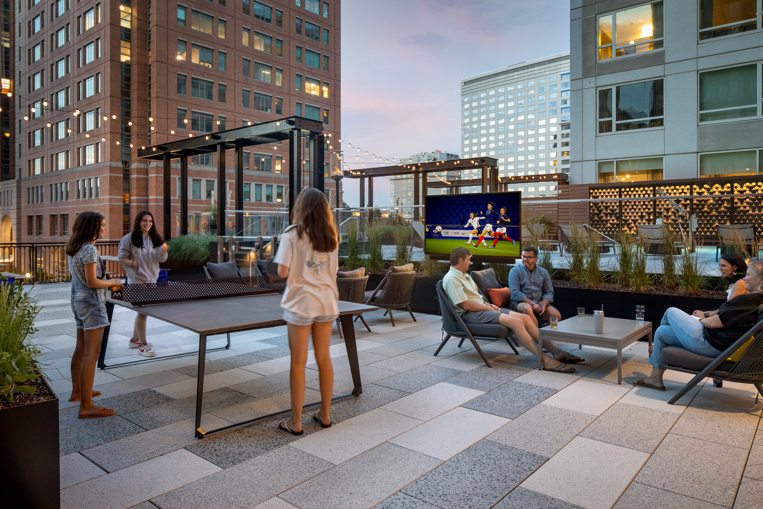  Evening view of outdoor table tennis and group seating at Gables Seaport Amenity Terrace (Photo by Ed Wonsek) 