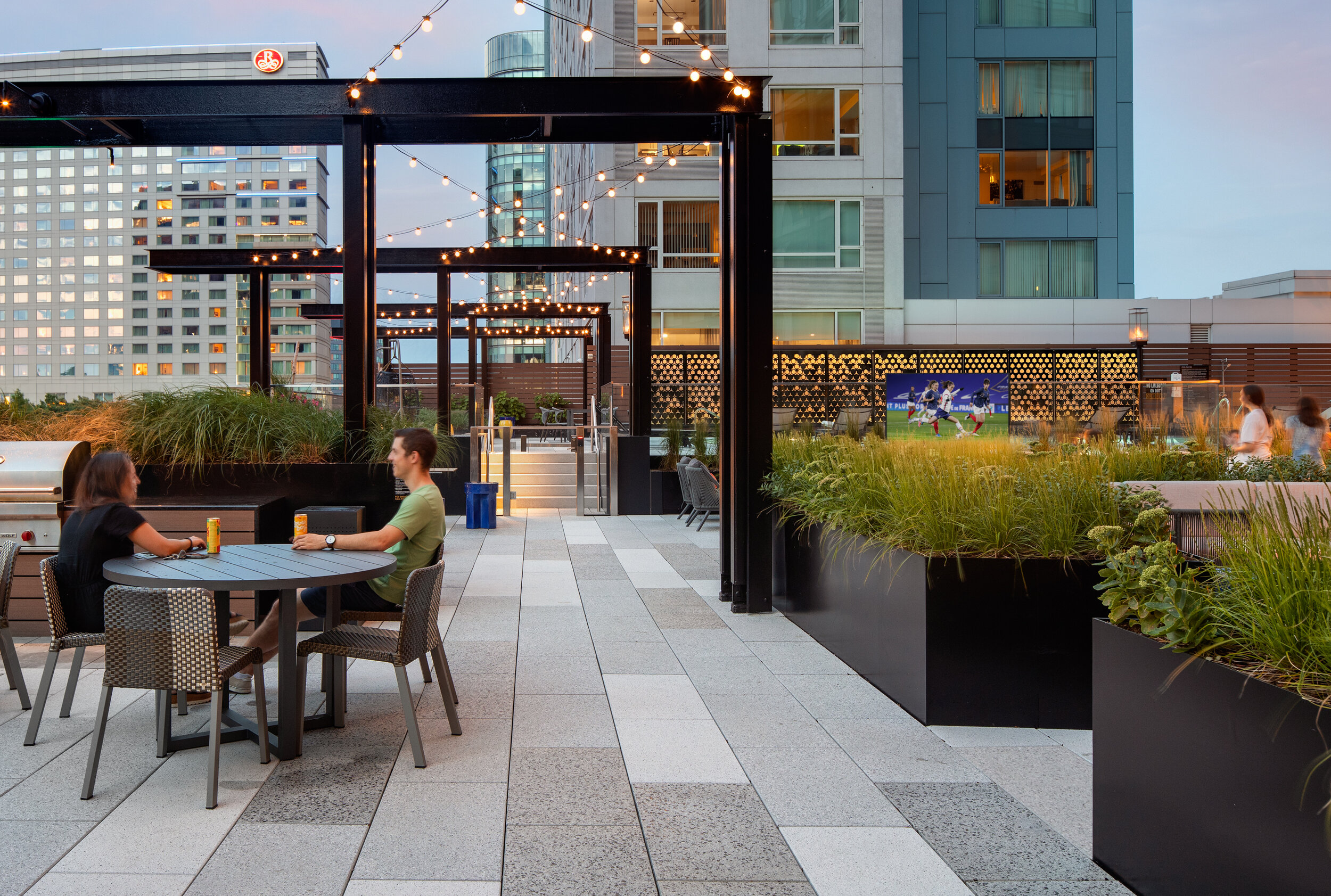  Grill stations with pergola lighting at Gables Seaport Amenity Terrace (Photo by Ed Wonsek) 