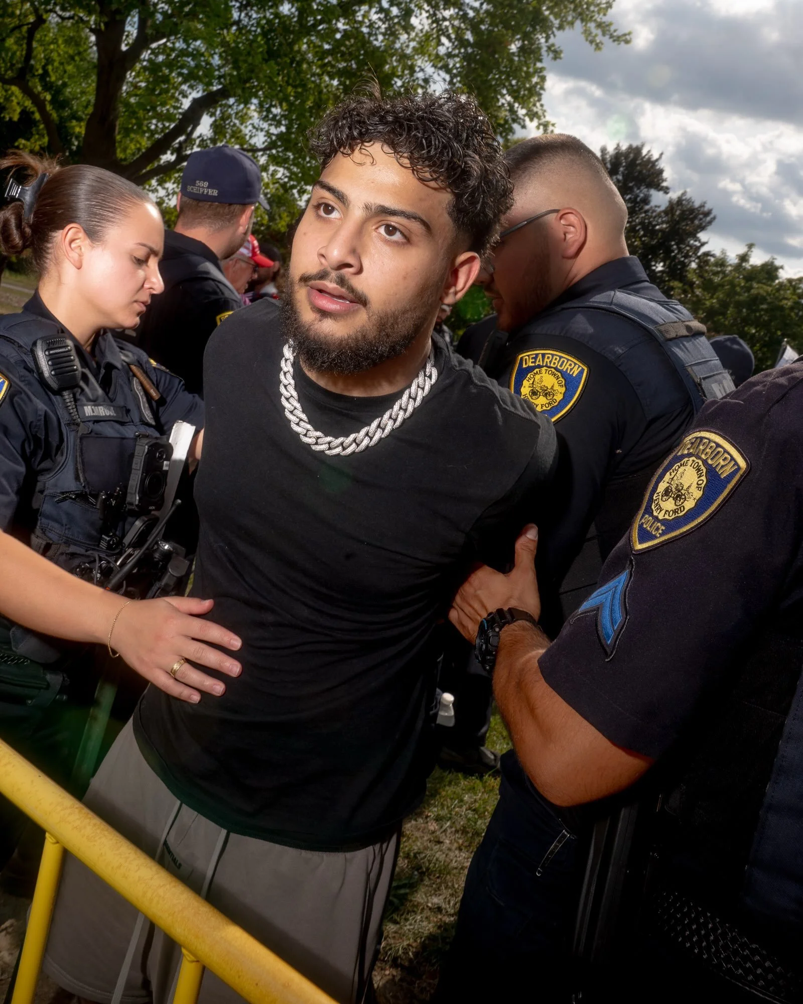 Chaos and spectacle at the &ldquo;christian crusade&rdquo; demonstration at a Dearborn, MI, City Council meeting organized by January 6 participant Jake Lang. Lang came to antagonize and did so from behind the protection of an army of publicly funded