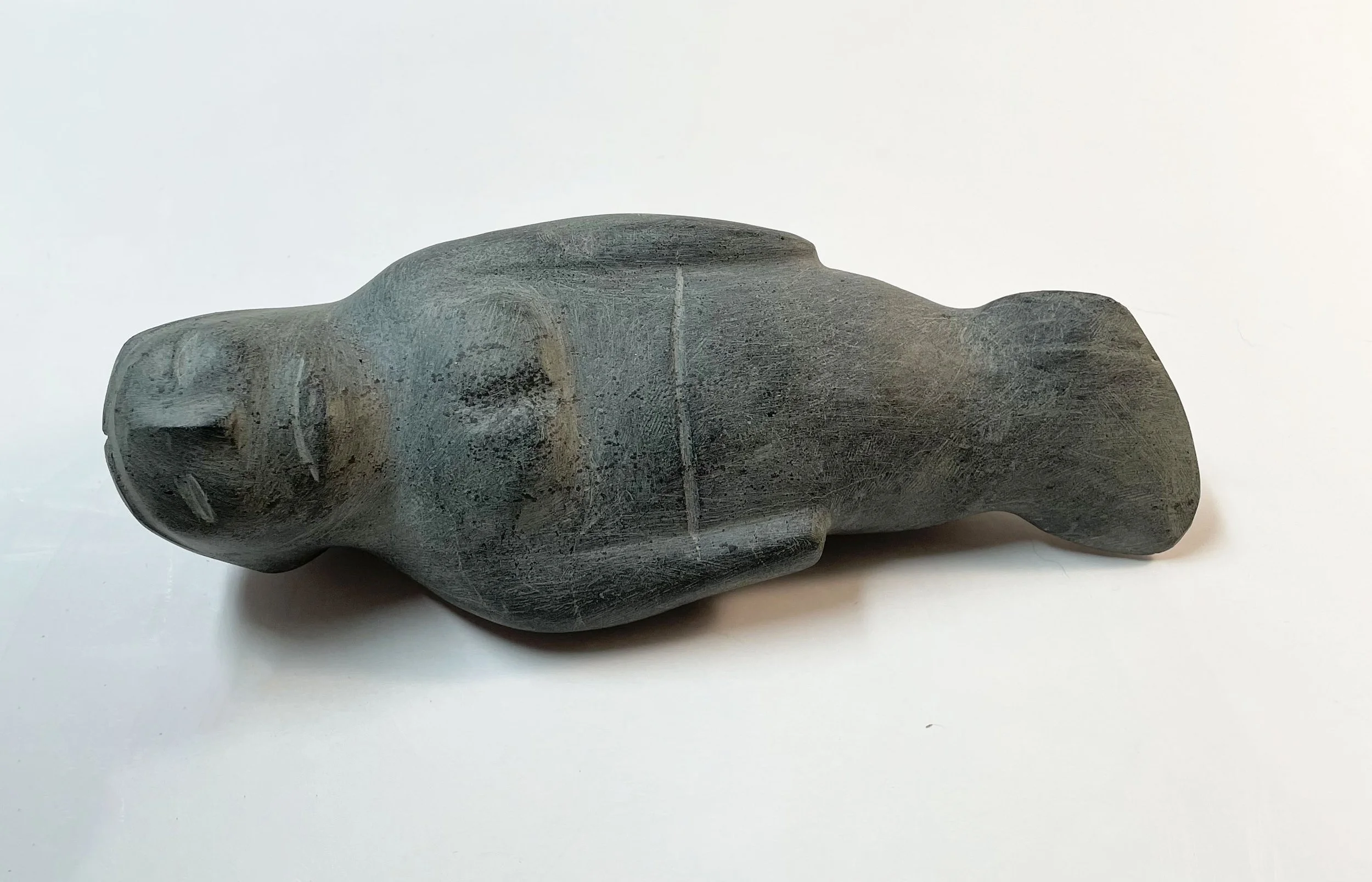 David Arnasungaaq, 1964-, Sedna, stone, 4x9x2.JPG