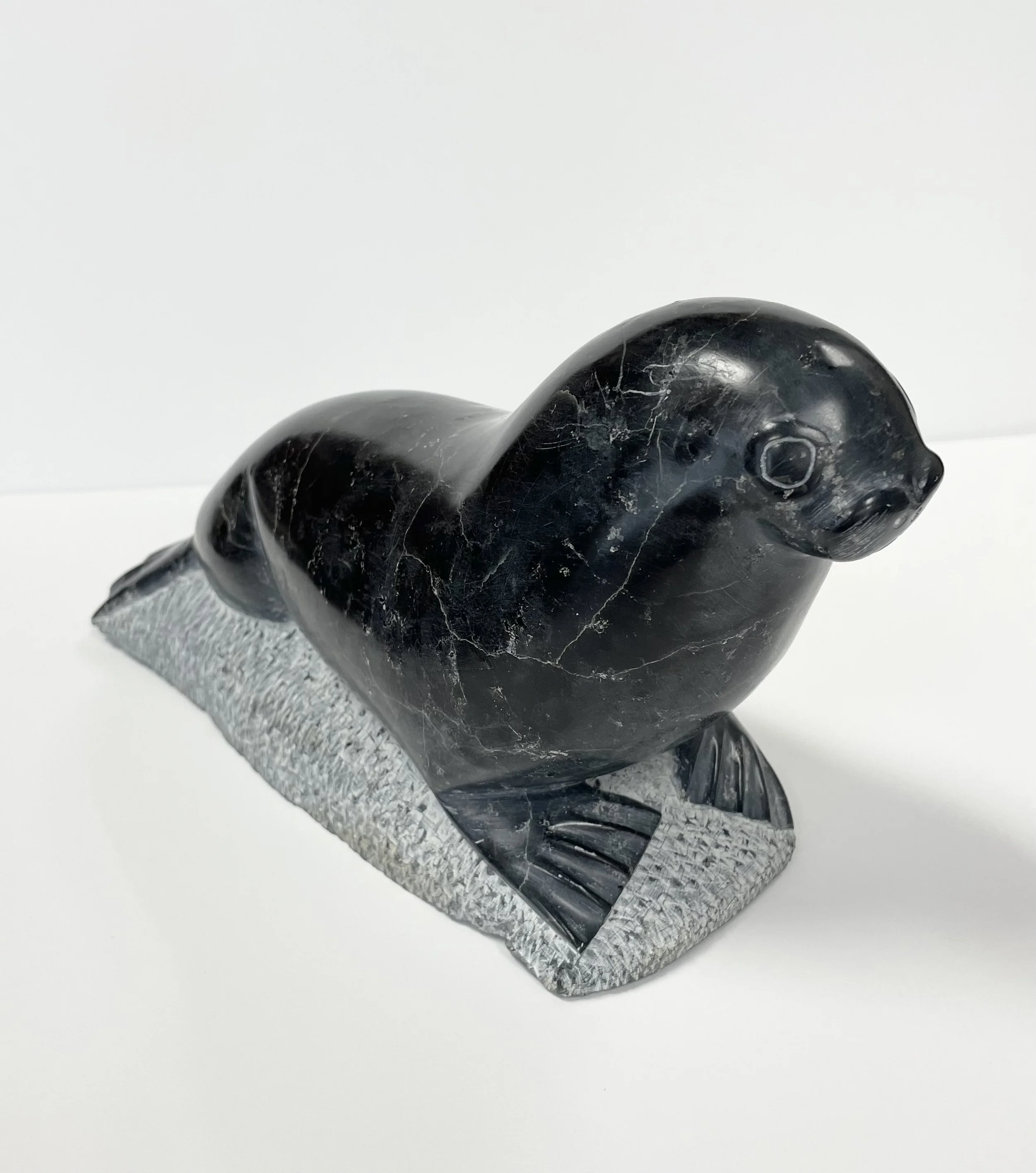 Noah Tukai Paulosie, 1938-, Seal, stone, 6x11.5x5 -2.jpg