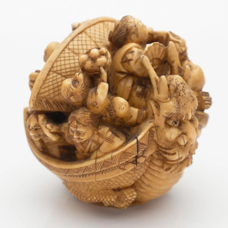 IVORY OKIMONO OF TRAVELLERS ON A BOAT, 19TH CENTURY 2.jpg