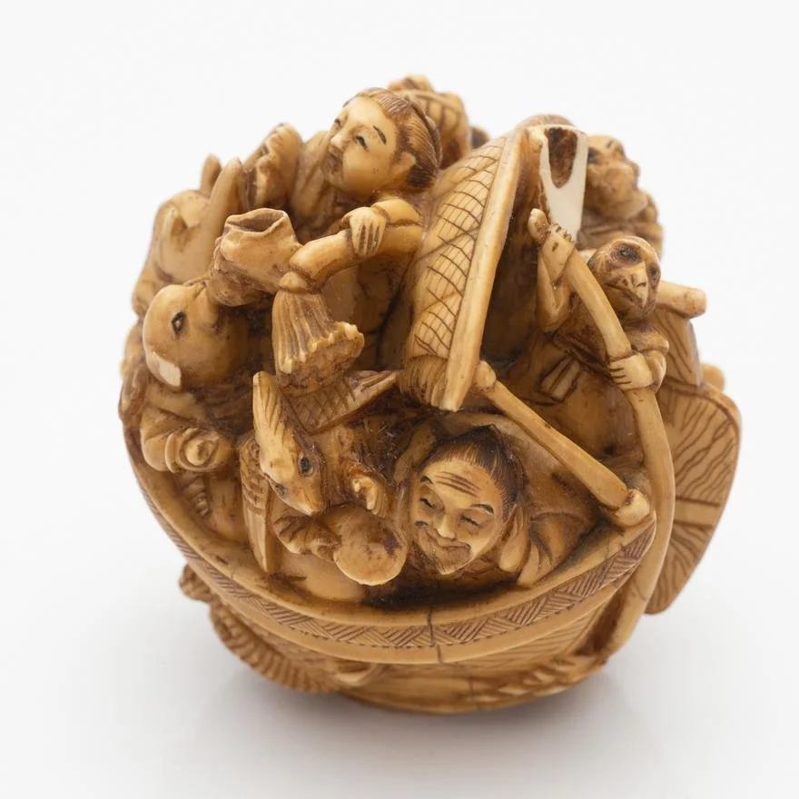 IVORY OKIMONO OF TRAVELLERS ON A BOAT, 19TH CENTURY 3.jpg