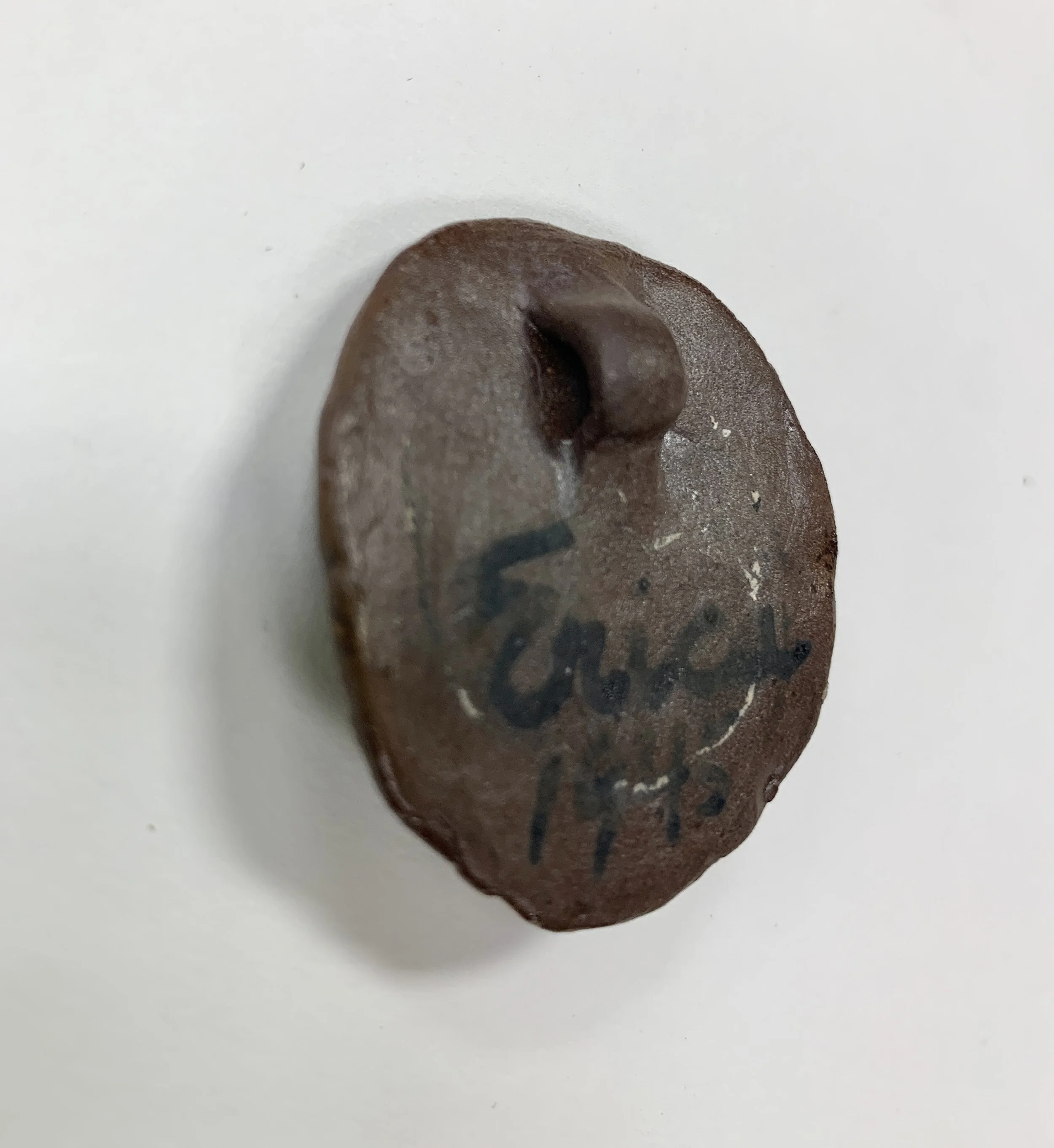 Deichmann Pottery - Face Pendant (back-side).jpg