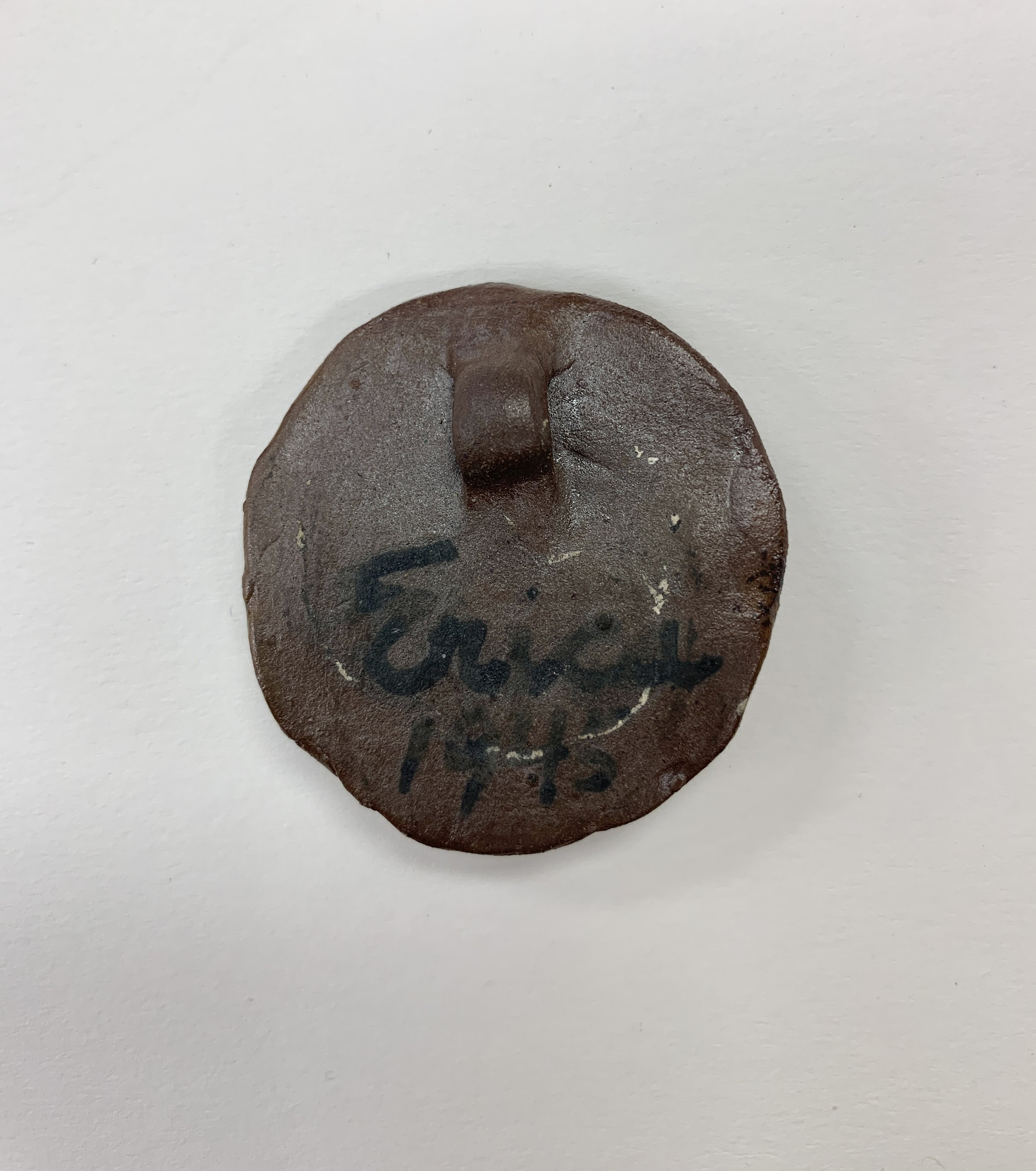 Deichmann Pottery - Face Pendant (back 1).jpg