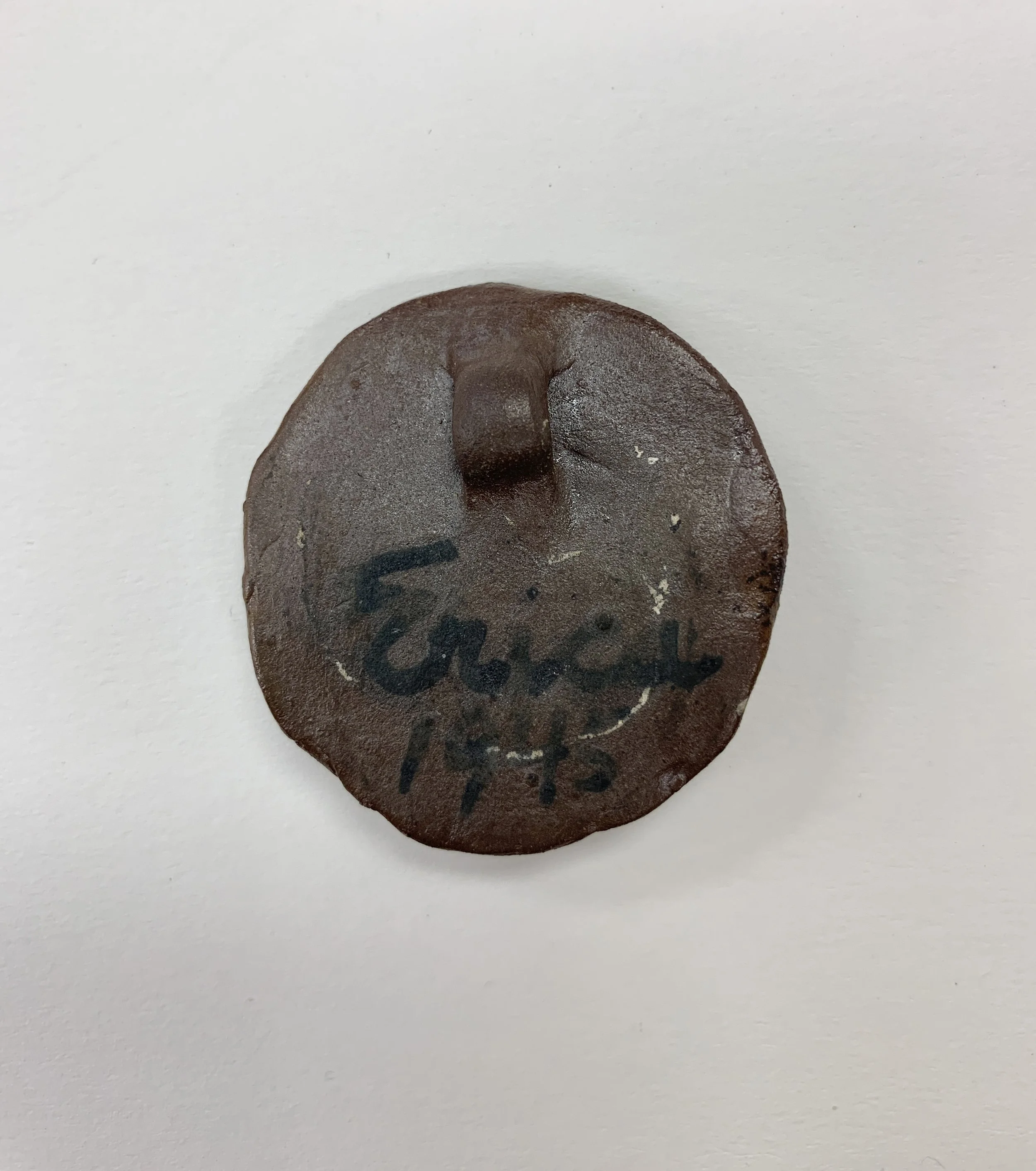 Deichmann Pottery - Face Pendant (back 1).jpg