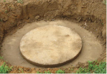 Your Septic, being dug out before risers are installed