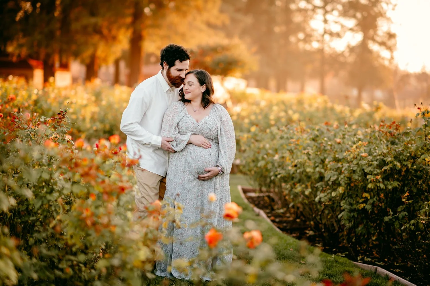 Outdoor maternity photography session in Palo Alto capturing natural pregnancy portraits during golden hour with soft light and genuine connection.