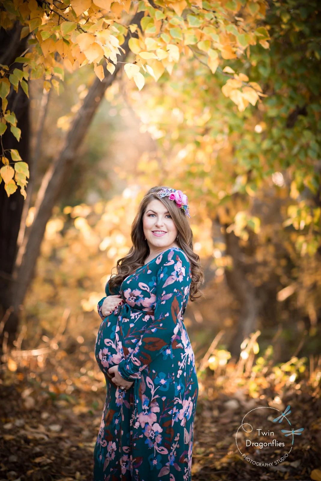 beautiful pregnant women covering her belly for maternity session in Los Gatos, Bay Area