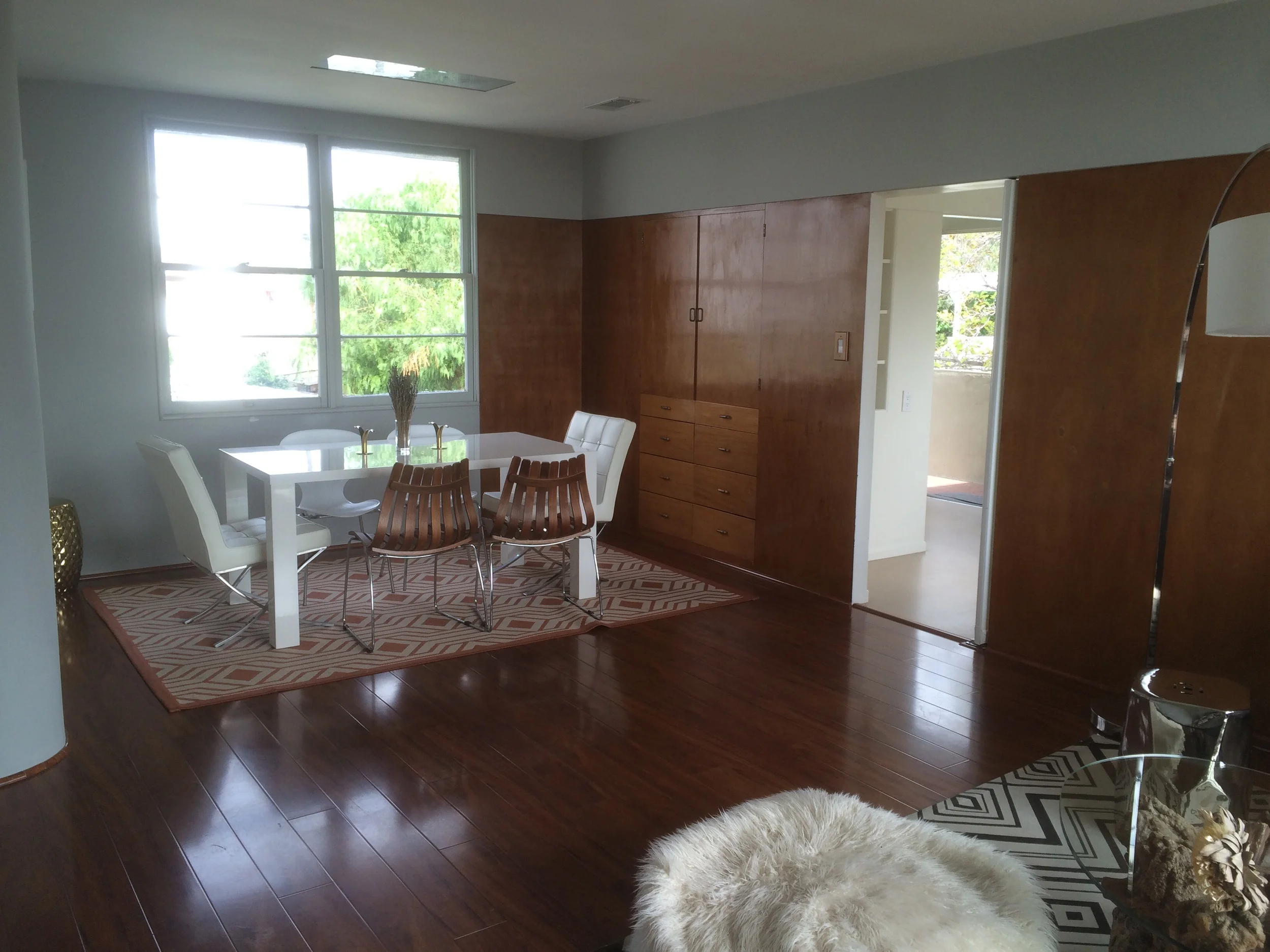 Upstairs living/dining with built-ins.