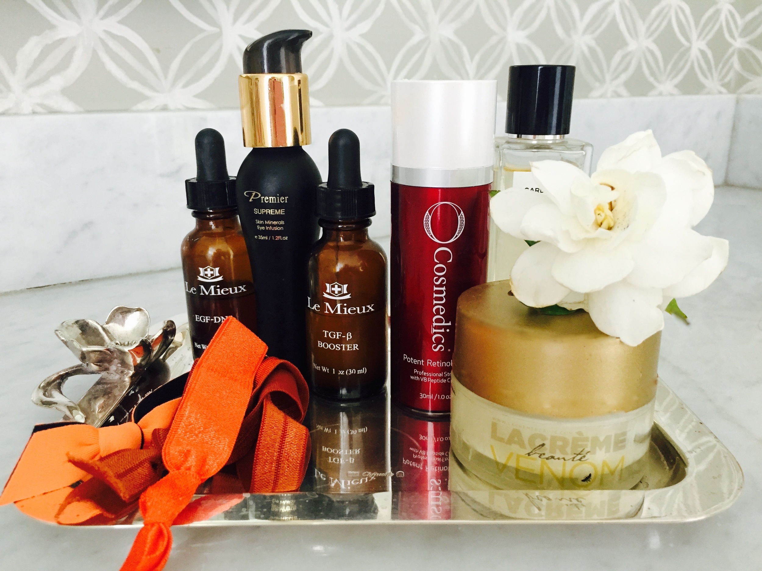 Lacreme is owned by Victoria Galbraith Wachtel. The GLOW , the Rose Lip Balm and the VENOM are her products. These are a must haves. Loreta & Victoria are beautiful women who care about women. LACREME VENOM, Le Mieux-EGF-DNA, Le Mieux-TGF-B BOOSTER , These two serums are fast acting along with Cosmedics,Retinol Serum. Emi-Jay Hair Ties , Chanel Gardenia Perfume . I have experienced adult acne the last few years, but with this retinol serum it has worked wonders. FYI I use it every night, my face rarely breaks out. Honestly!. 