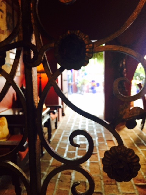 Gate leading into patio dining area at Hotel California