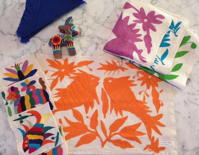 Colorful handmade placemats & napkins.
