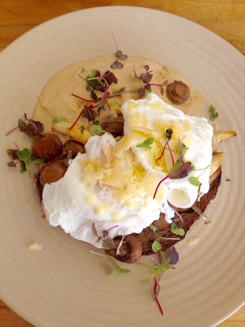 "Mushrooms" or something similarly non-descript. Mushroom ragout on rye toast with poached eggs and mushroom "foam". 