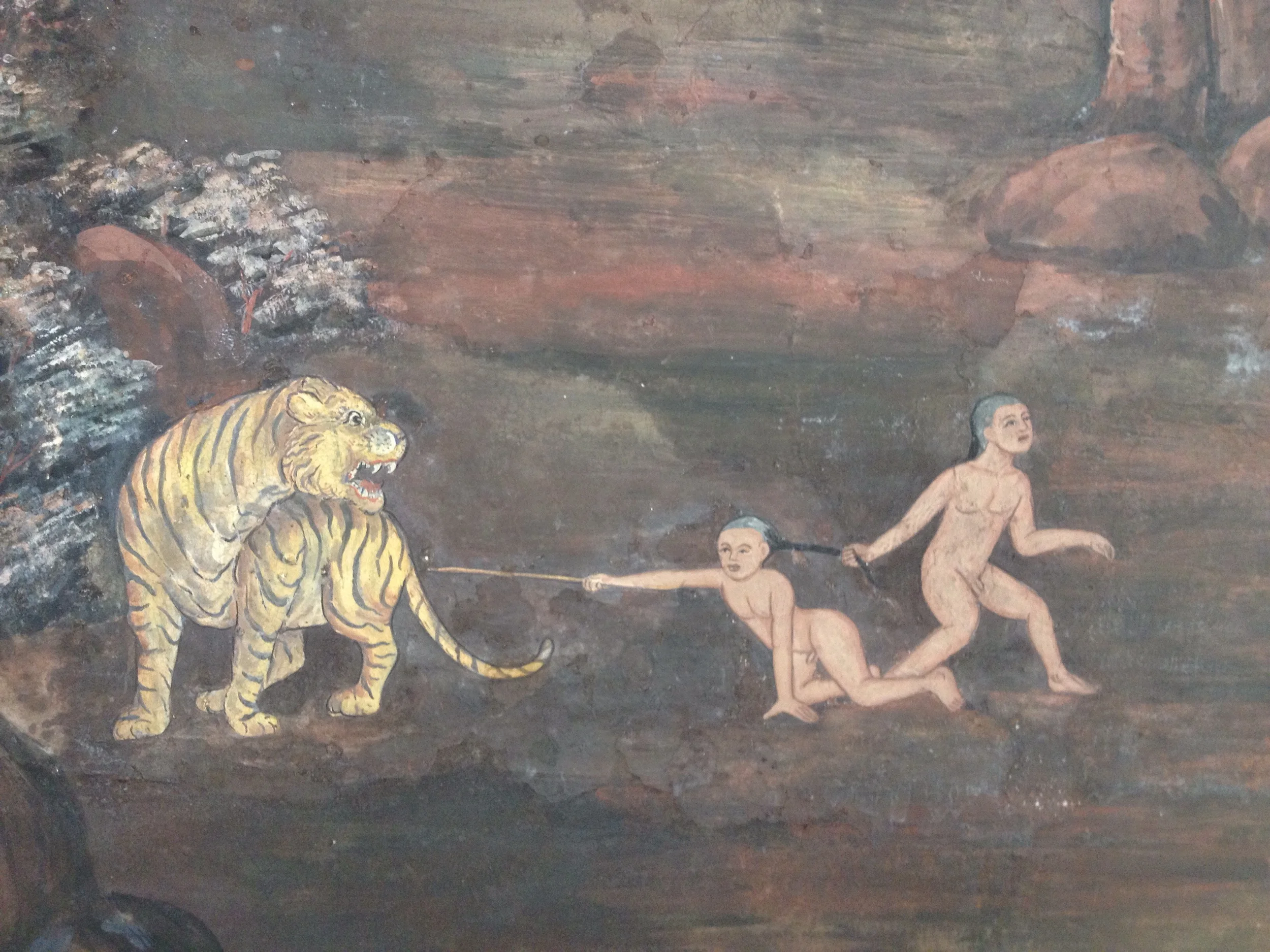 Yes, listen to your friend, child, do not poke the tiger!