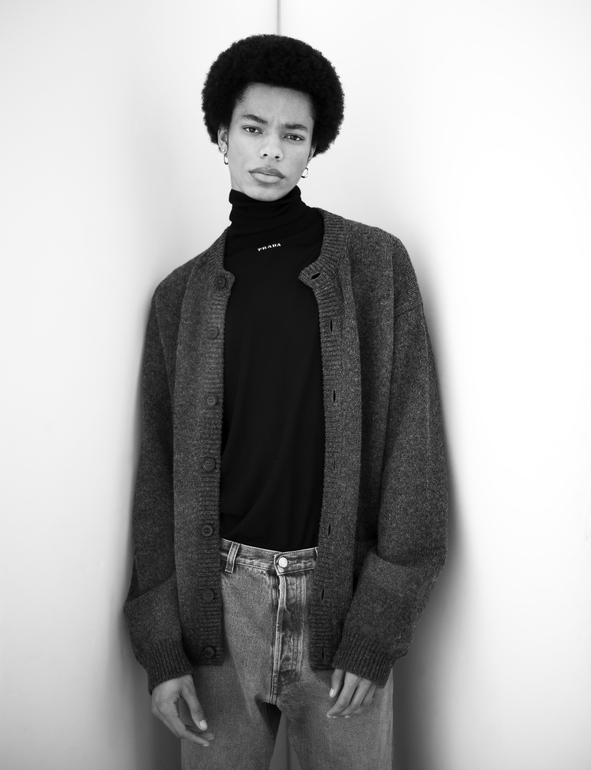 Justin Xavier wearing Prada