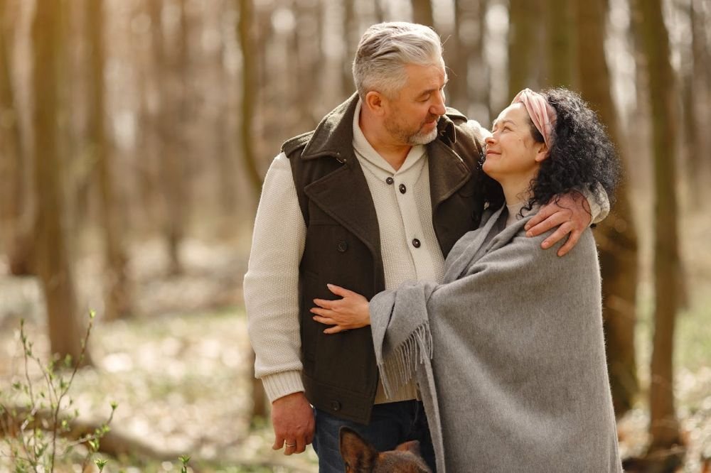 A couple walking in forest