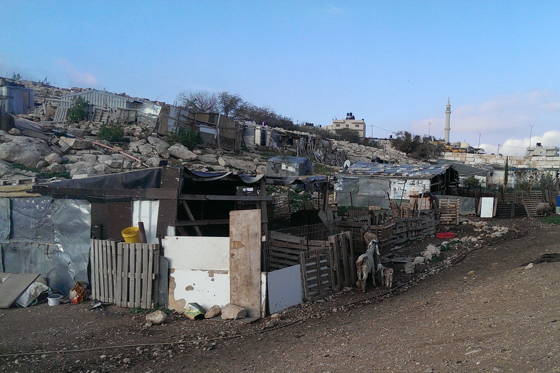 Small Bedouin camp located on the slope below 'Bawabet al-Quds'
