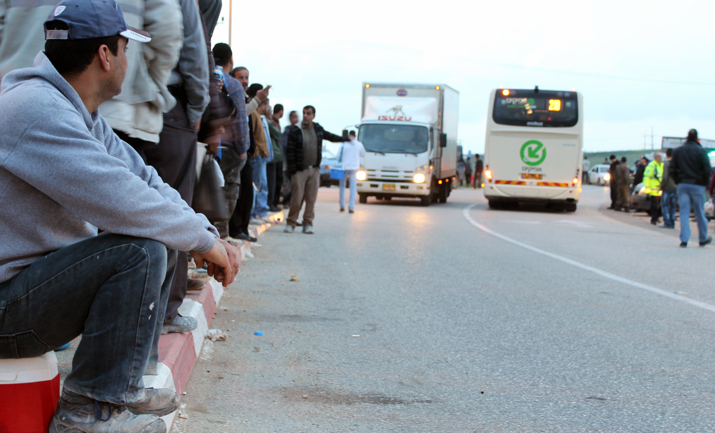 20130305 - Palestinian worker wait for bus.jpg