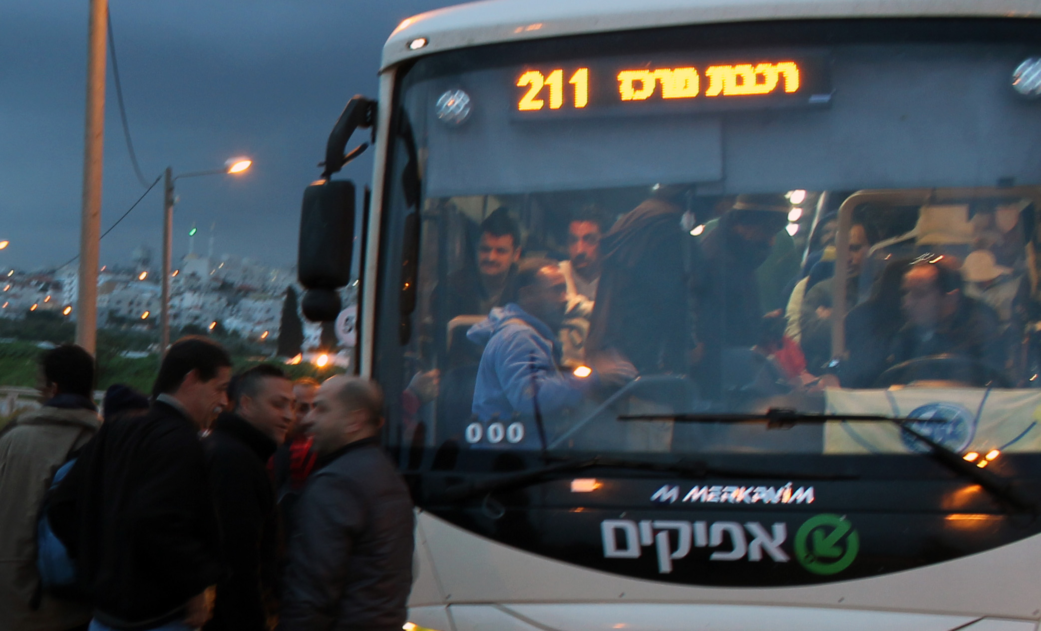 20130305 - Palestinian workers board bus cropped.jpg