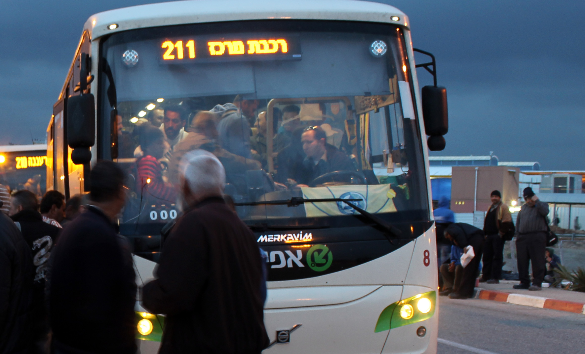 20130305 - Palestinian workers in front of bus.jpg