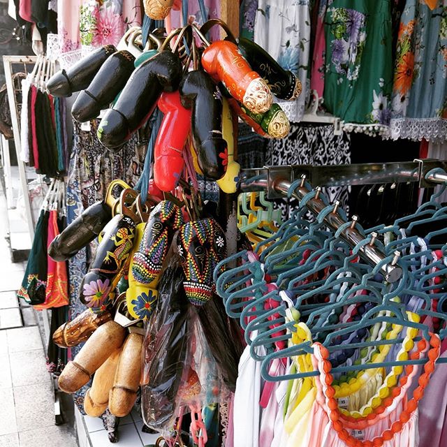 #Souvenir from #Bali anyone? Most of the souvenir shops in #seminyak sell colorful variations of this potent bottle opener. #phallus #inappropriatesouvenier #penisart #worldtraveler #discoverBali