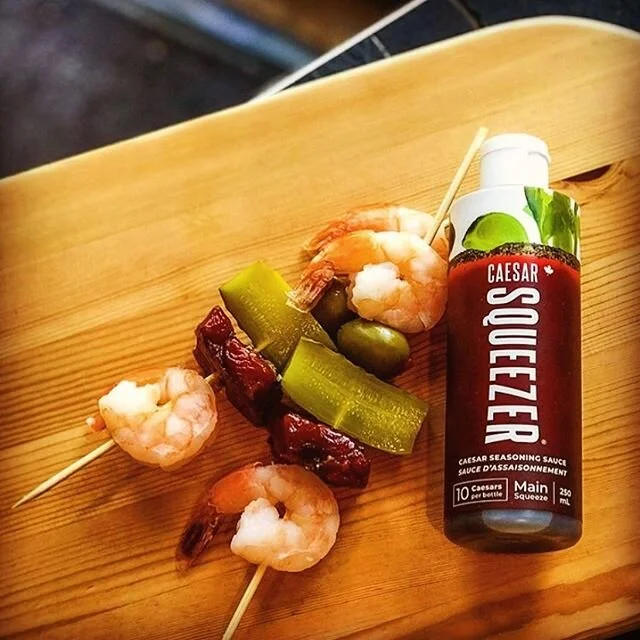 Step up your garnish game with these seafood Caesar skewers from @inletseafoods 🍤 Pick up a bottle of Caesar Squeezers while you&rsquo;re at it!