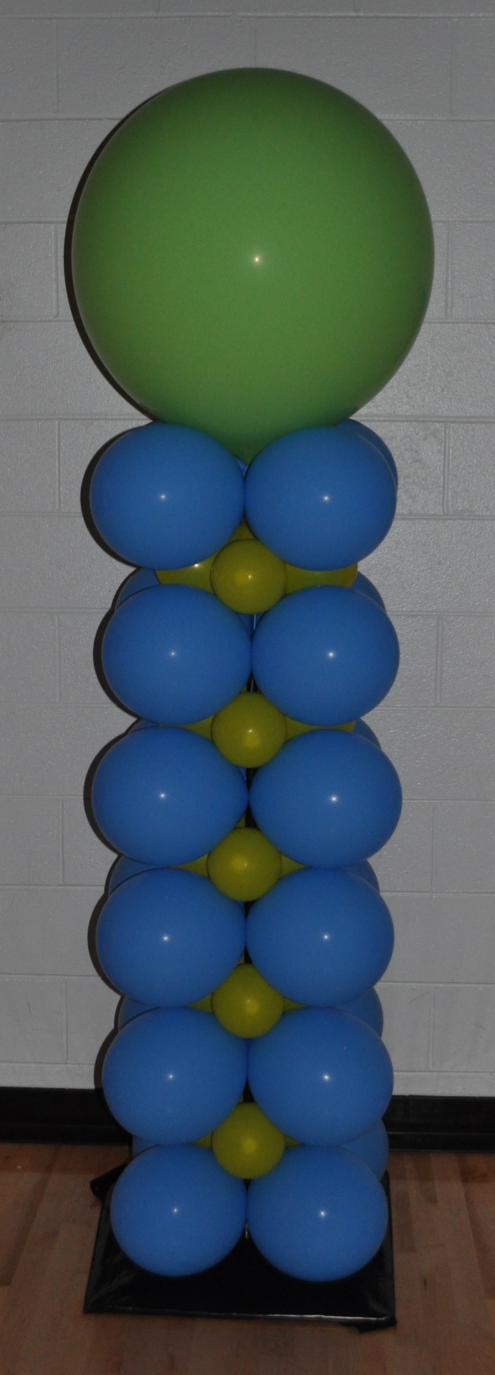 Green yellow and blue balloon column