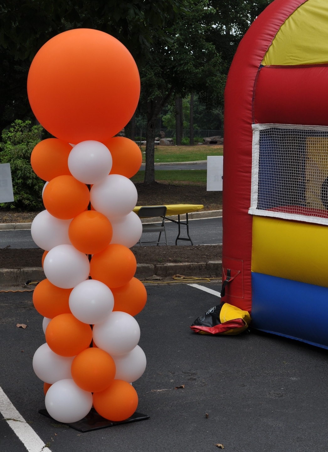 Orange and white outdoor balloon column