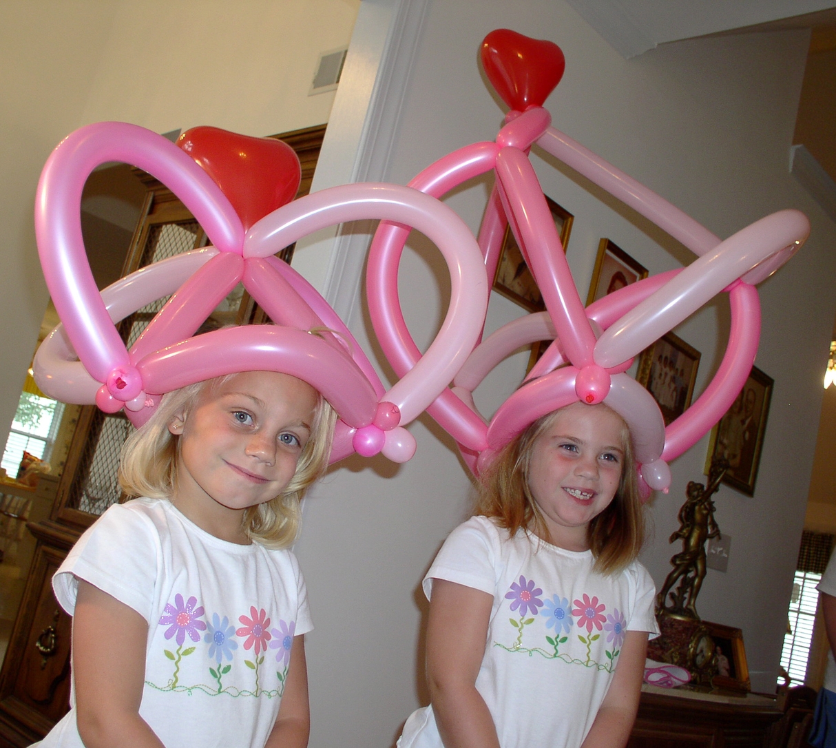 Pink balloon hats