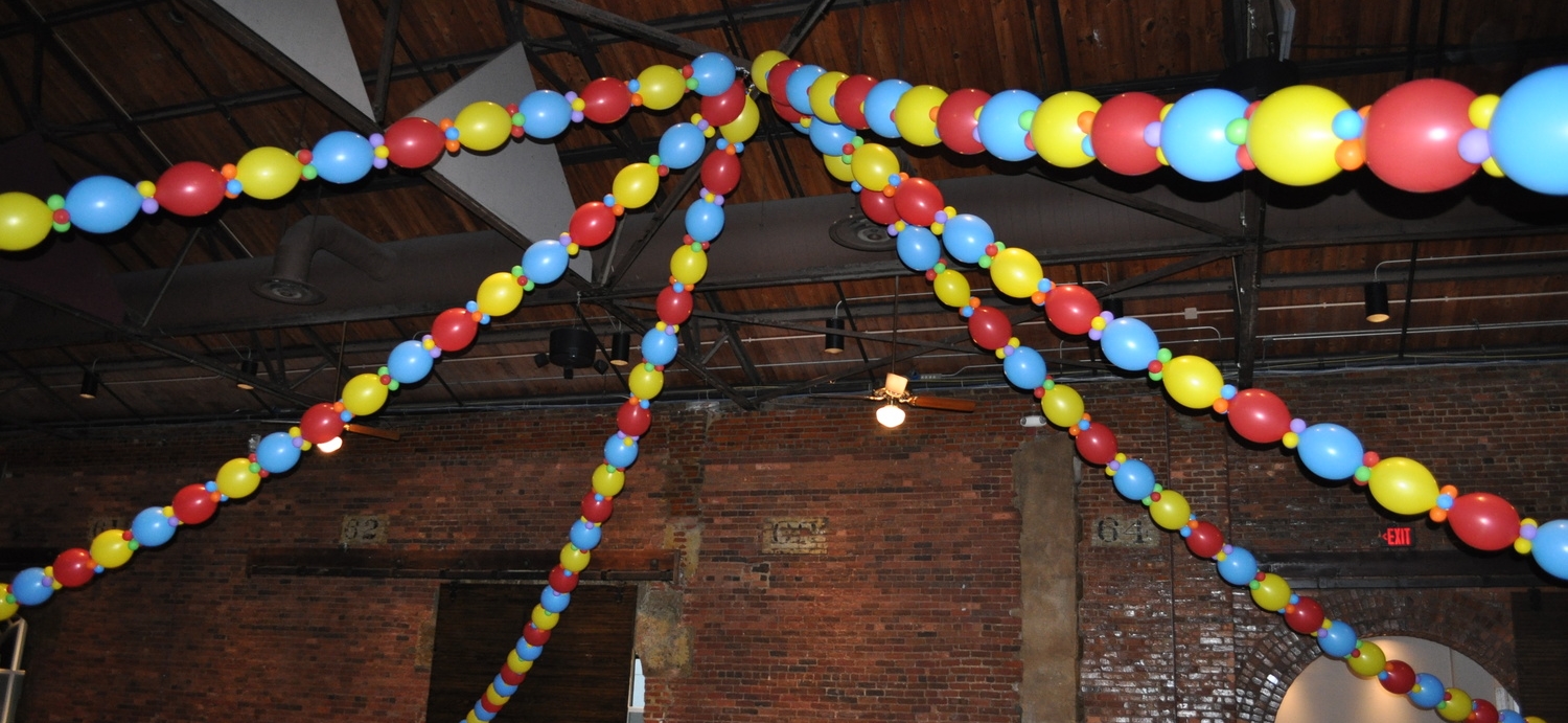 Circus-themed prom balloon big-top dance floor