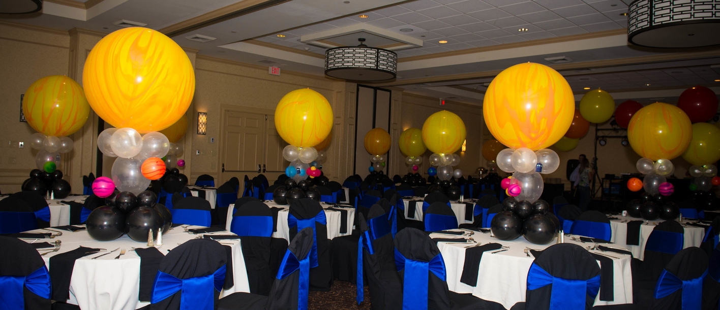 Doctor Who Bar Mitzvah balloon centerpieces - each sun with different planets