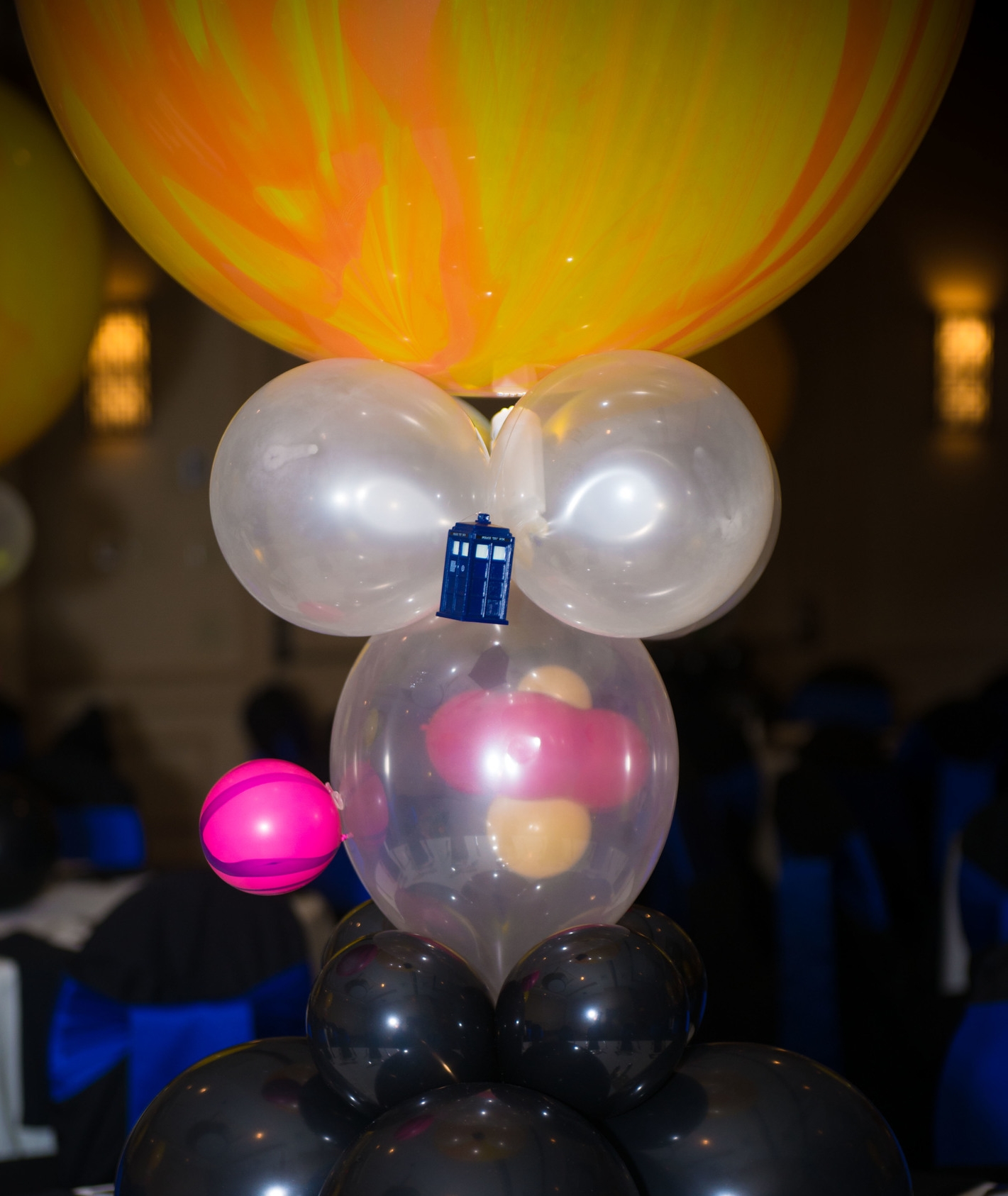 Doctor Who Bar Mitzvah balloon centerpieces - each with illuminated Tardis in orbit