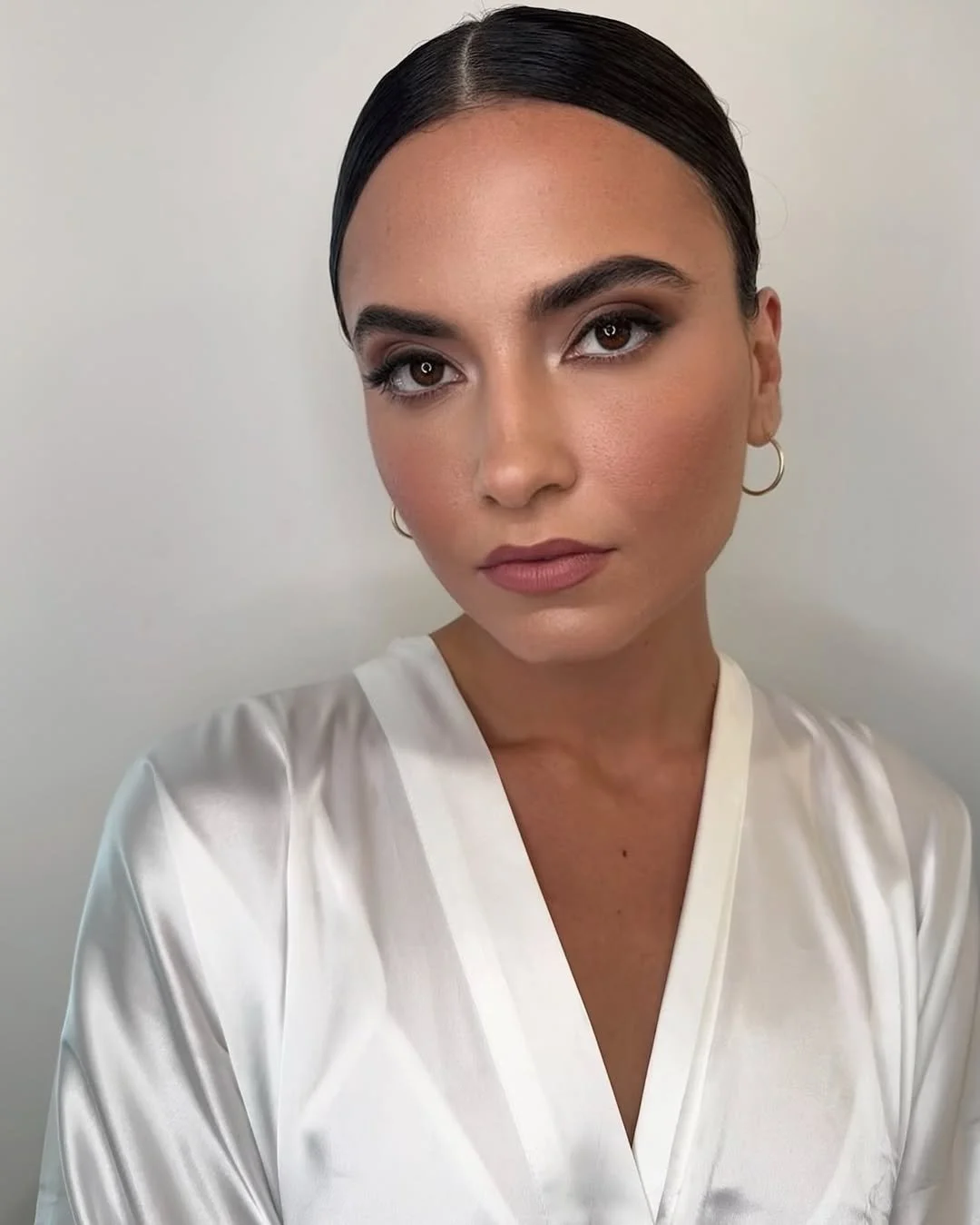 Polished makeup for a photoshoot.